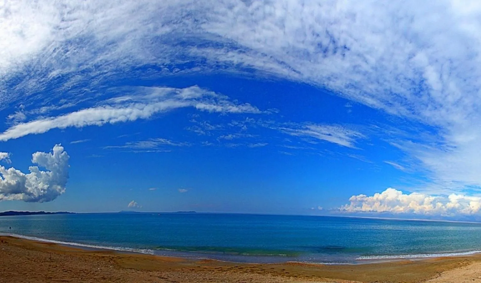 Beach in Elli Beach Apartments and Studios