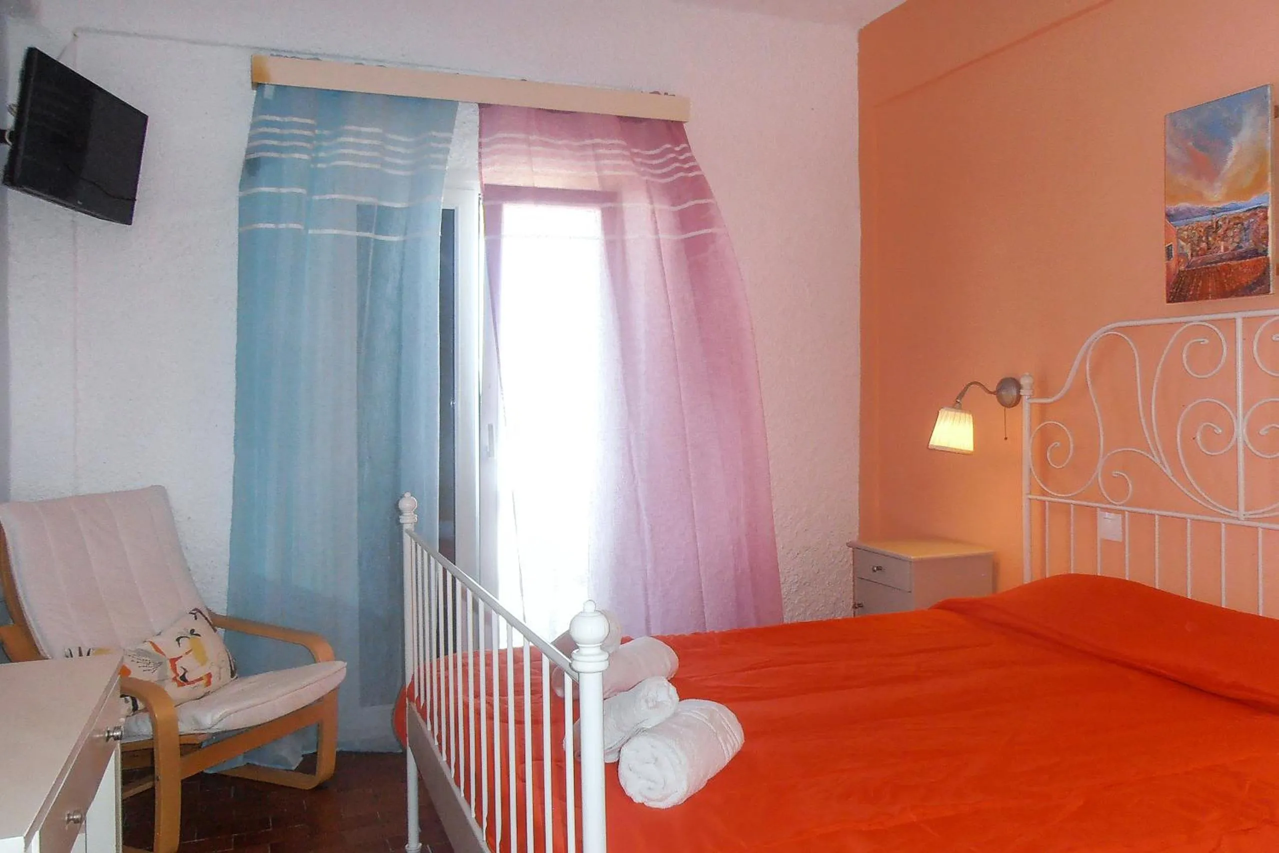 Bed in Elli Beach Apartments and Studios