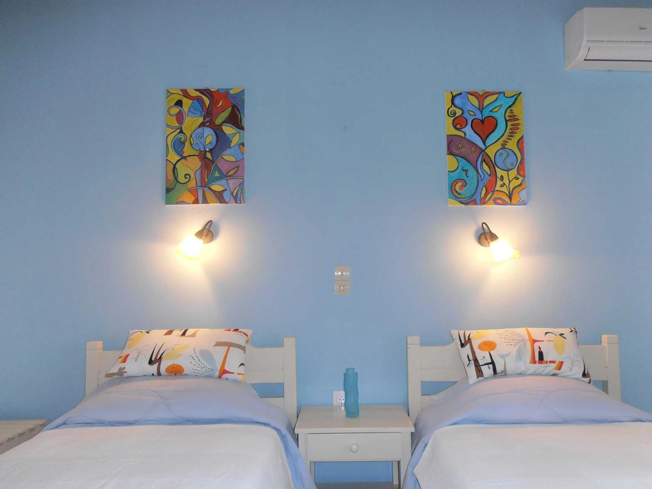 Bed in Elli Beach Apartments and Studios