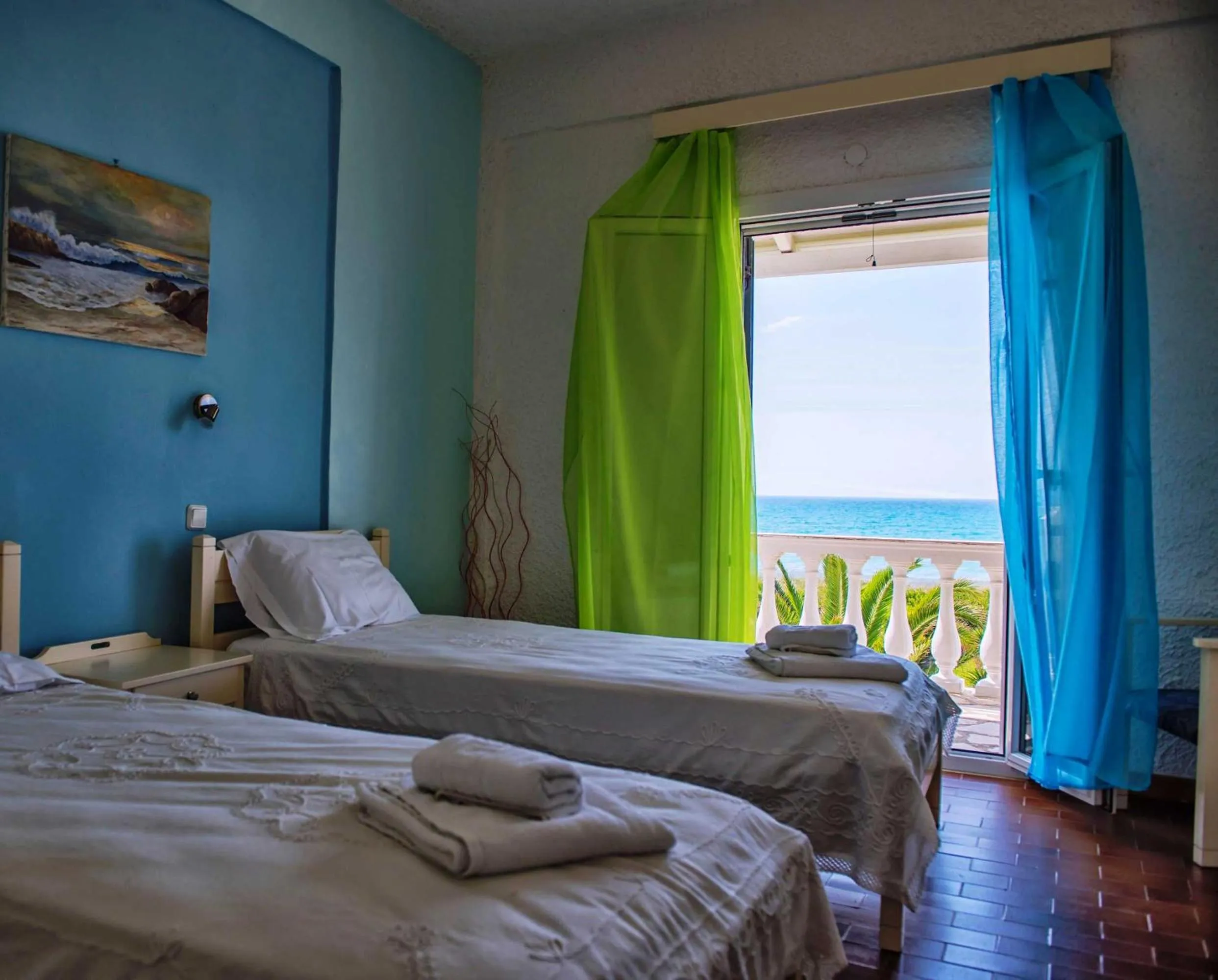 Bed in Elli Beach Apartments and Studios