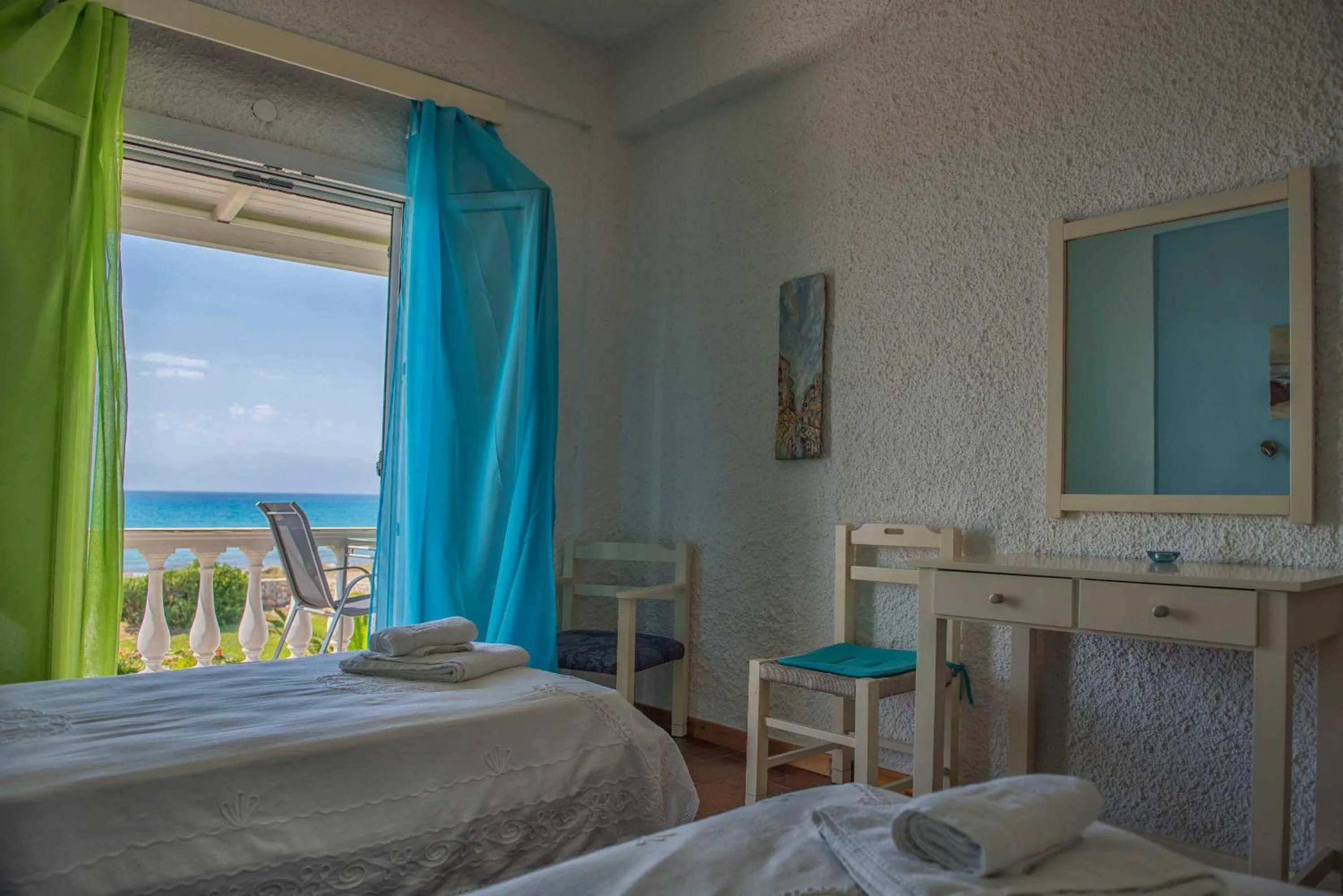 Bed in Elli Beach Apartments and Studios