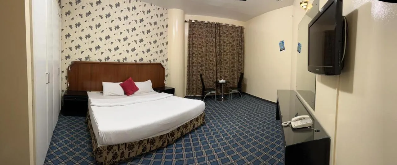 Bedroom in Al Zahabiya Hotel Apartments