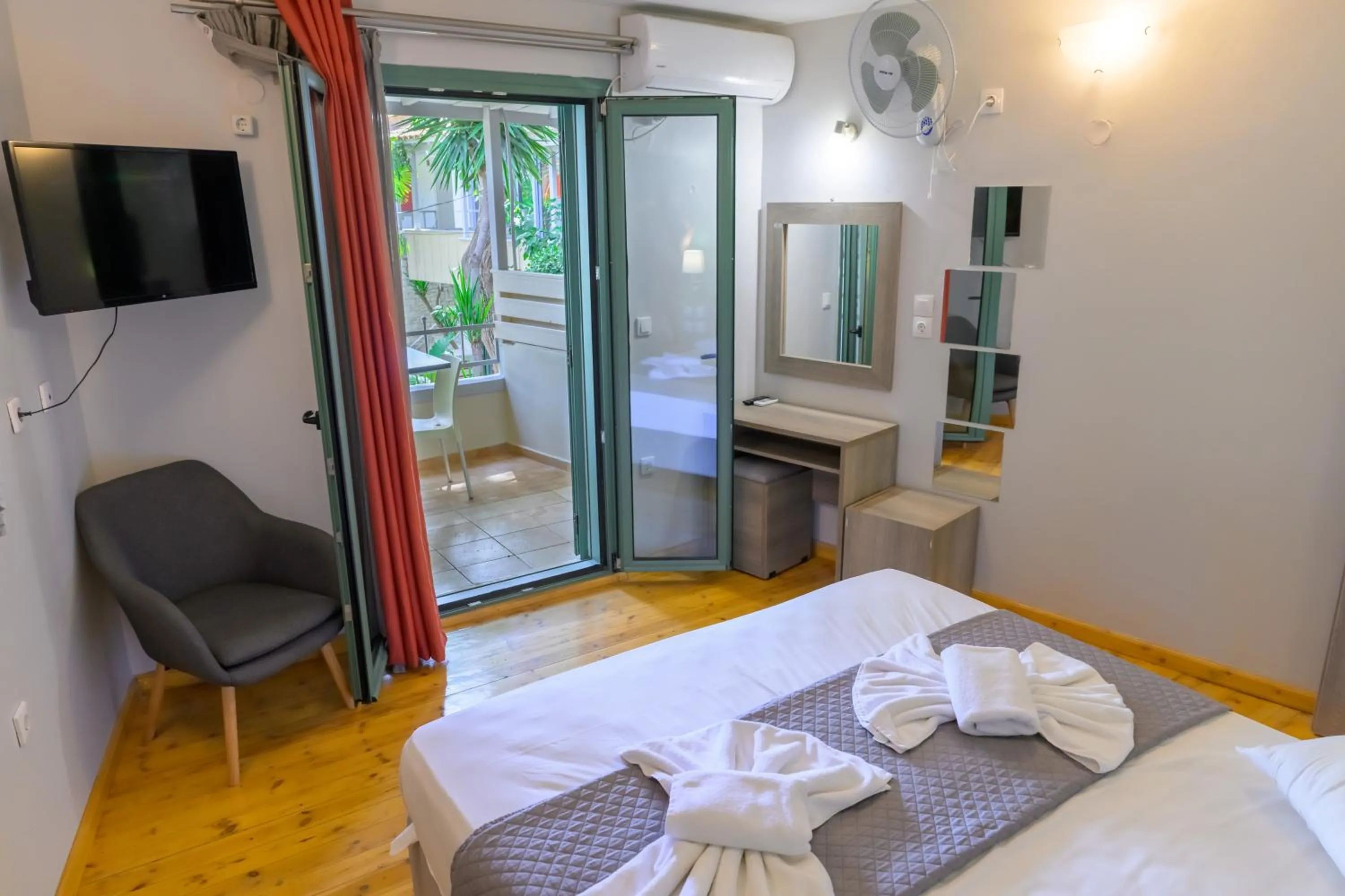 Bed in Rouda Bay Beach Hotel