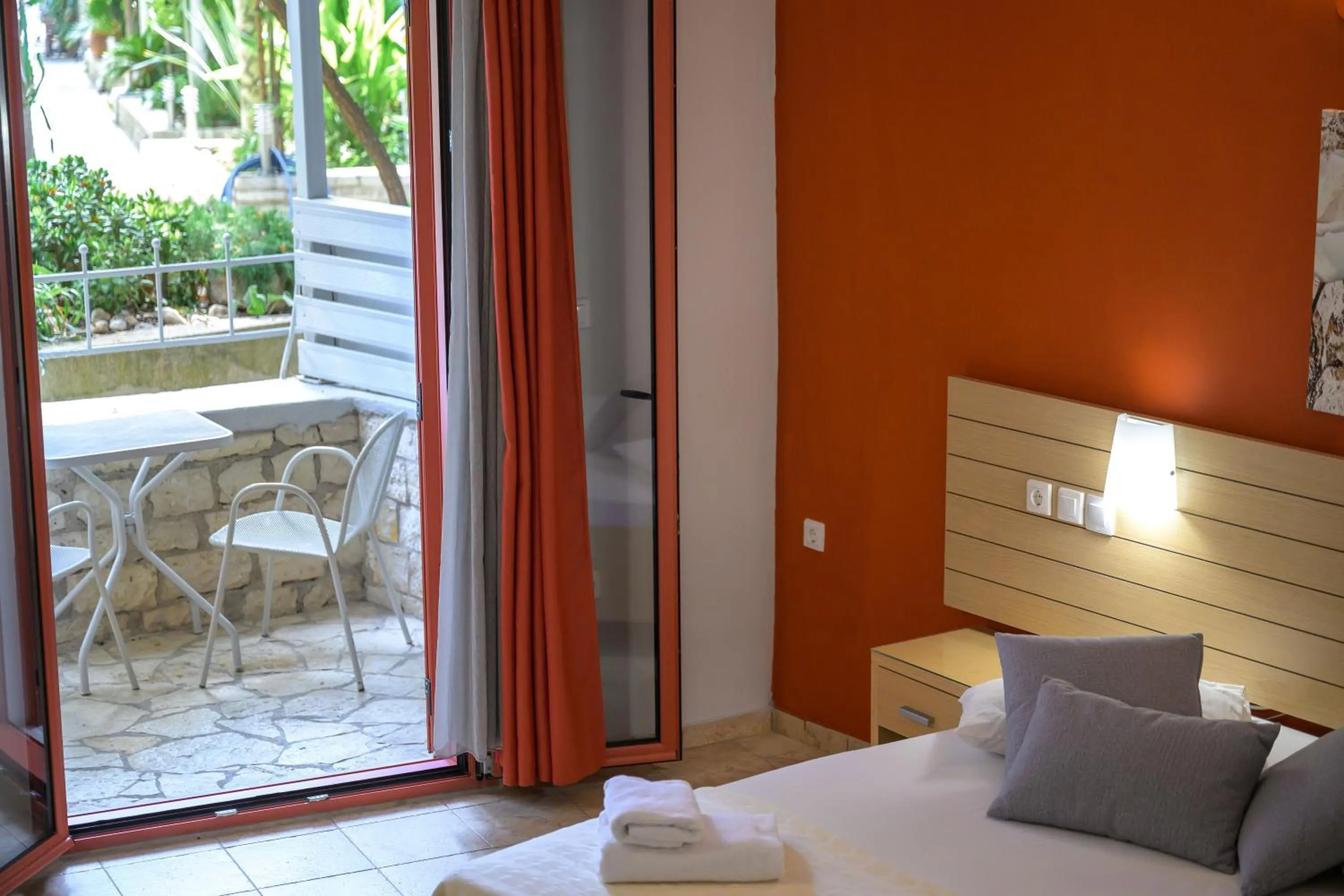 Bed in Rouda Bay Beach Hotel