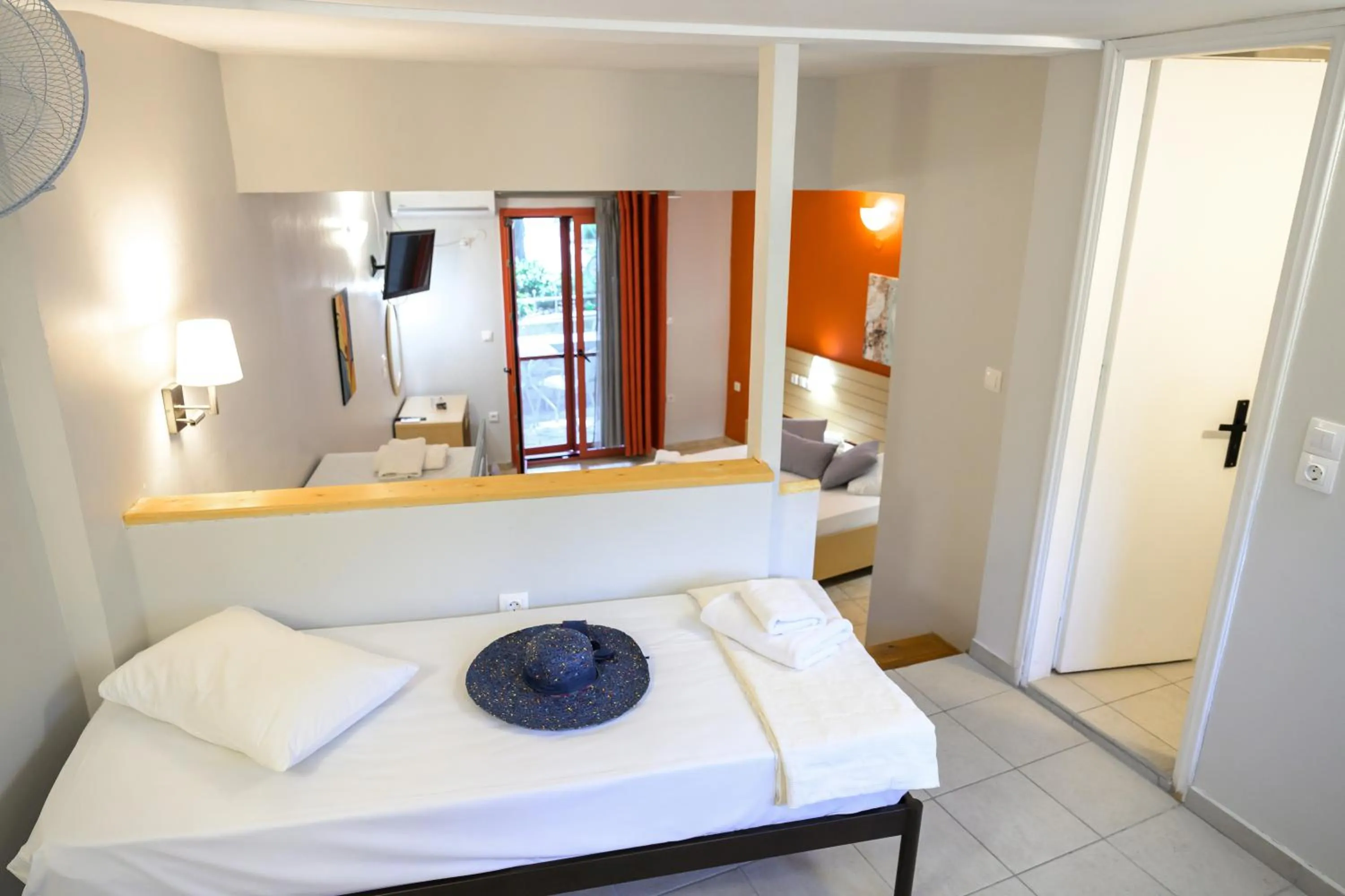 Bed in Rouda Bay Beach Hotel