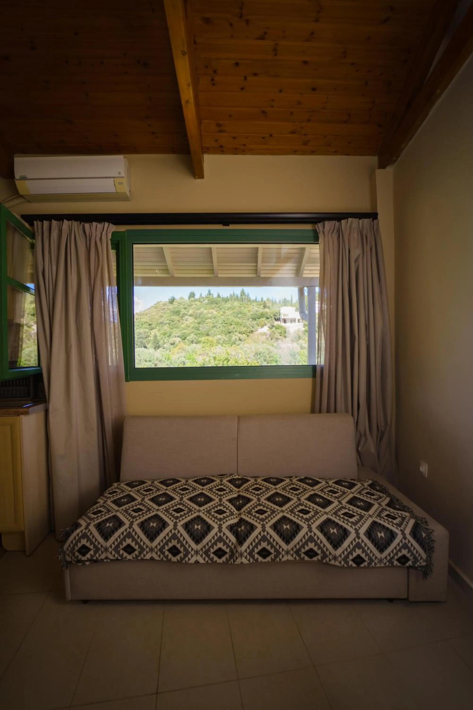 Bed in Rouda Bay Beach Hotel