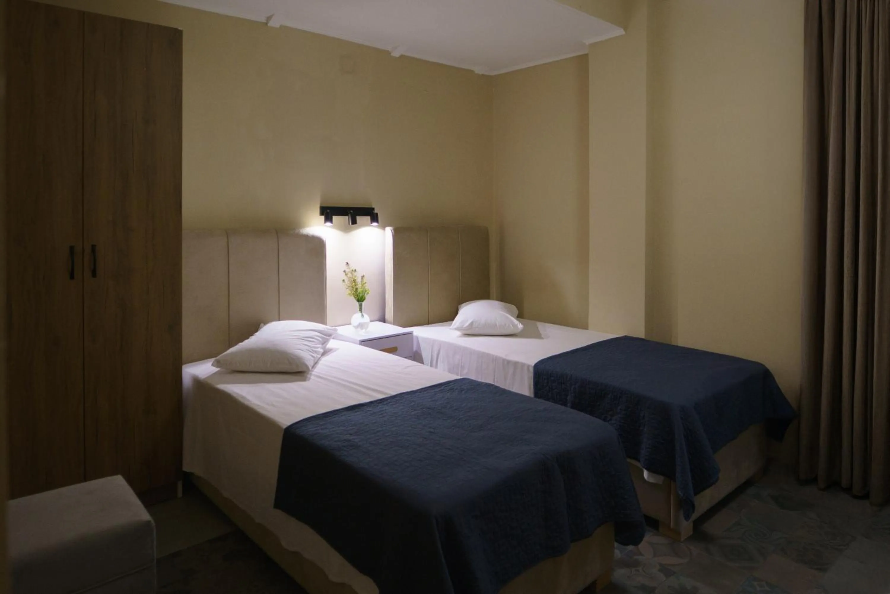 Bed in Rouda Bay Beach Hotel