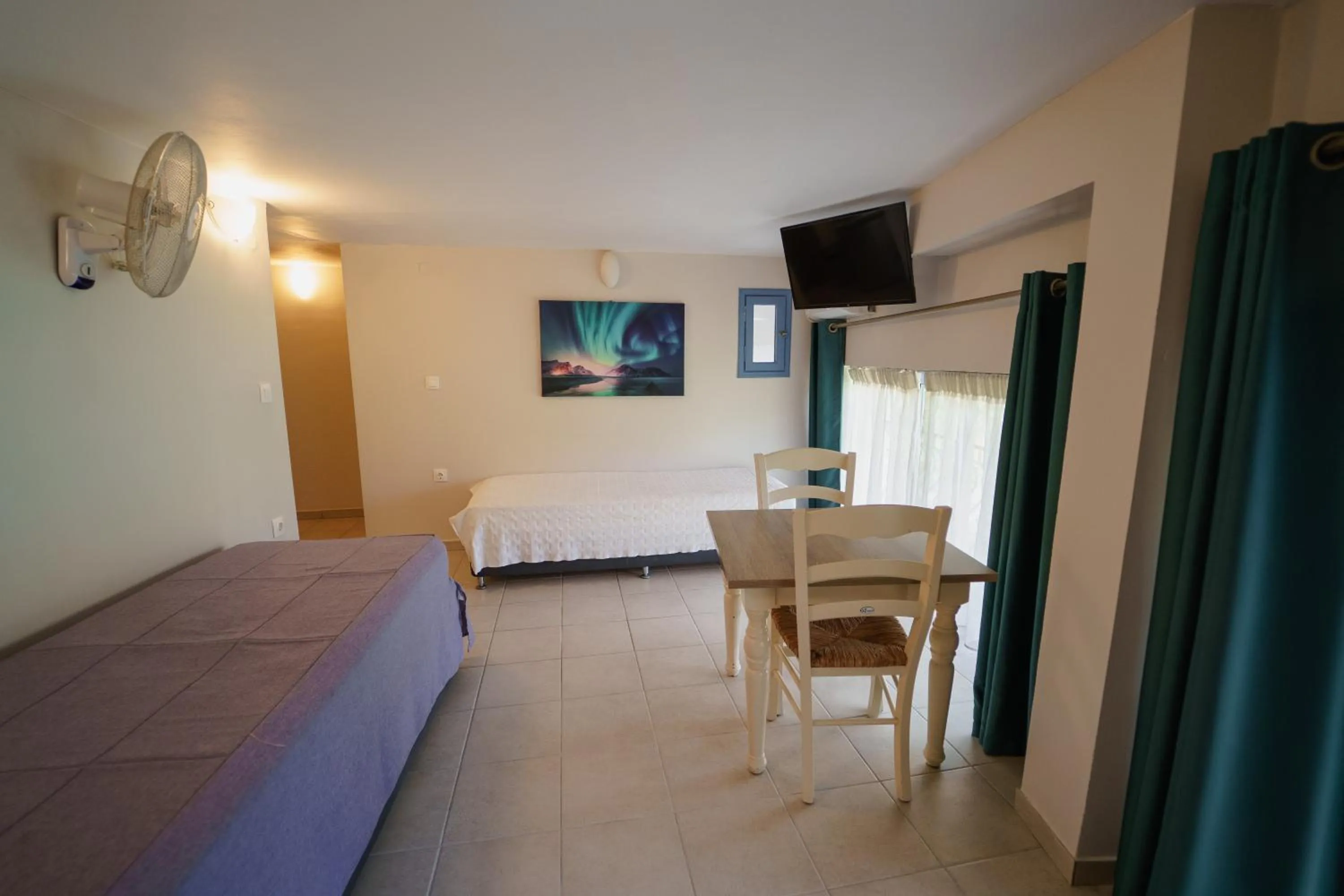 Bed in Rouda Bay Beach Hotel