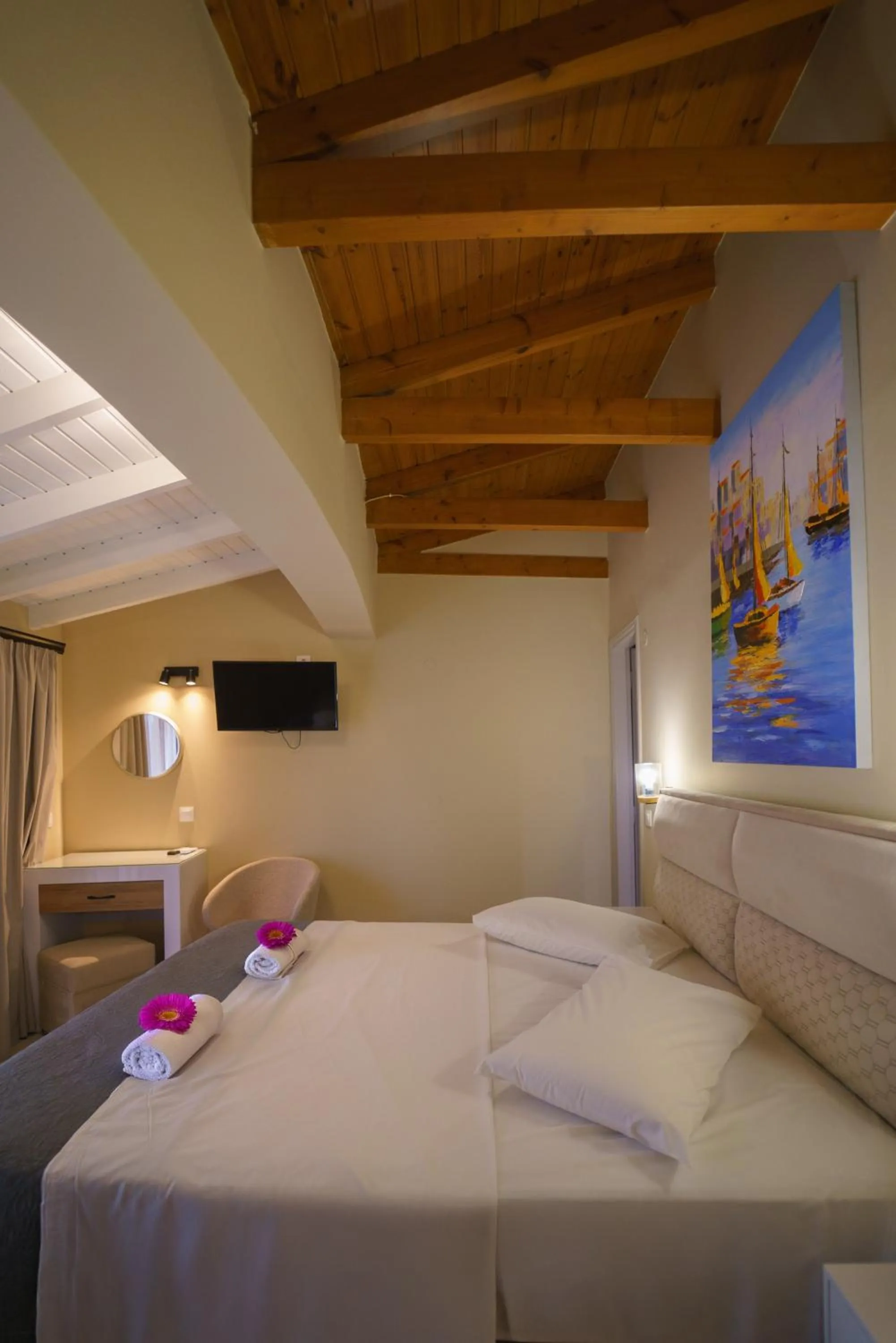 Bed in Rouda Bay Beach Hotel