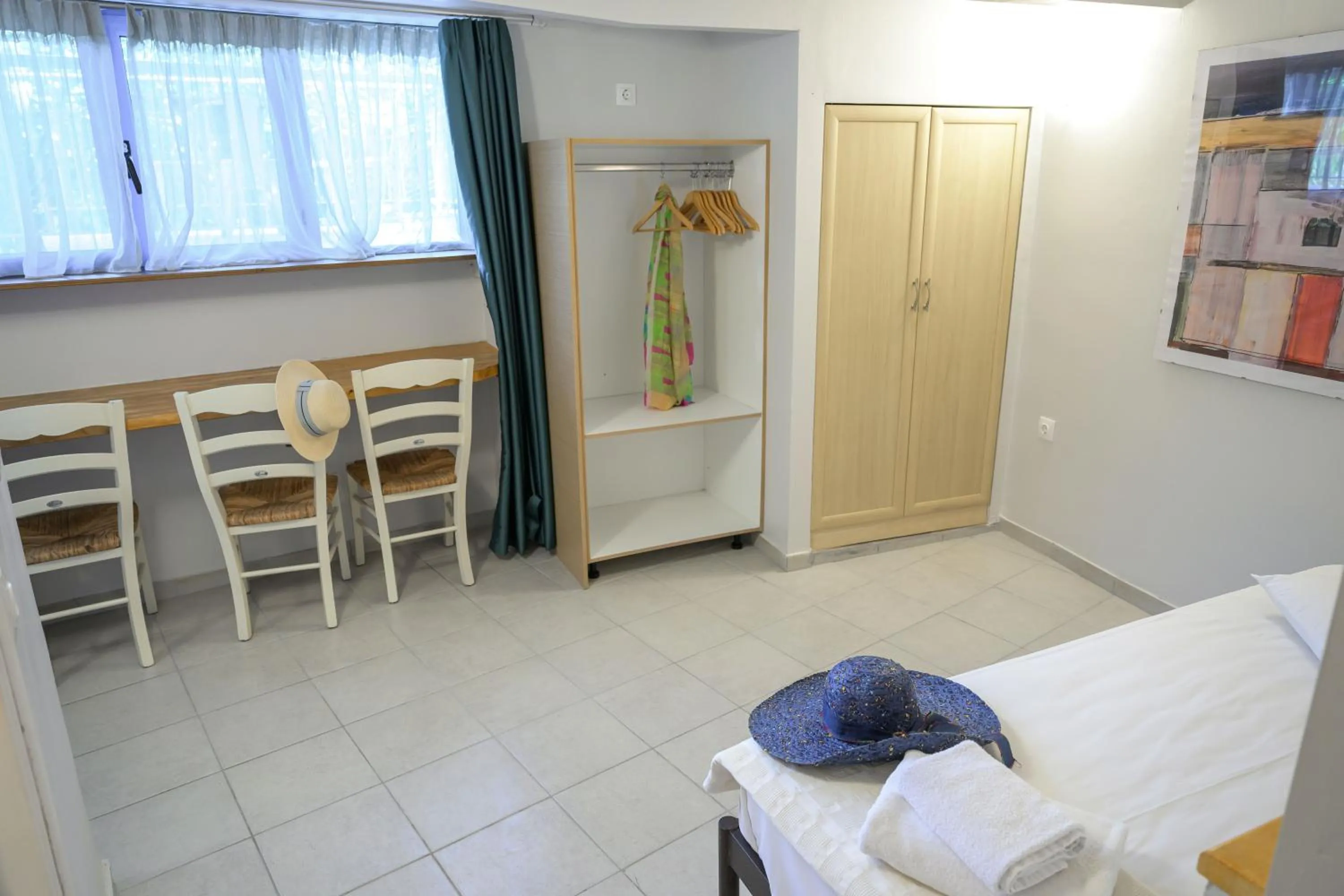 Bed in Rouda Bay Beach Hotel