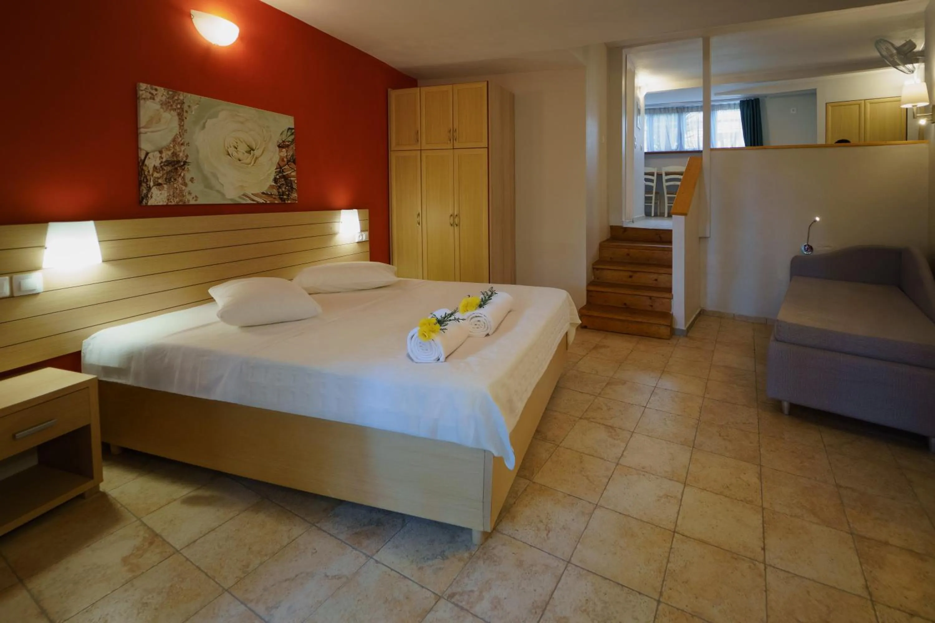 Bed in Rouda Bay Beach Hotel