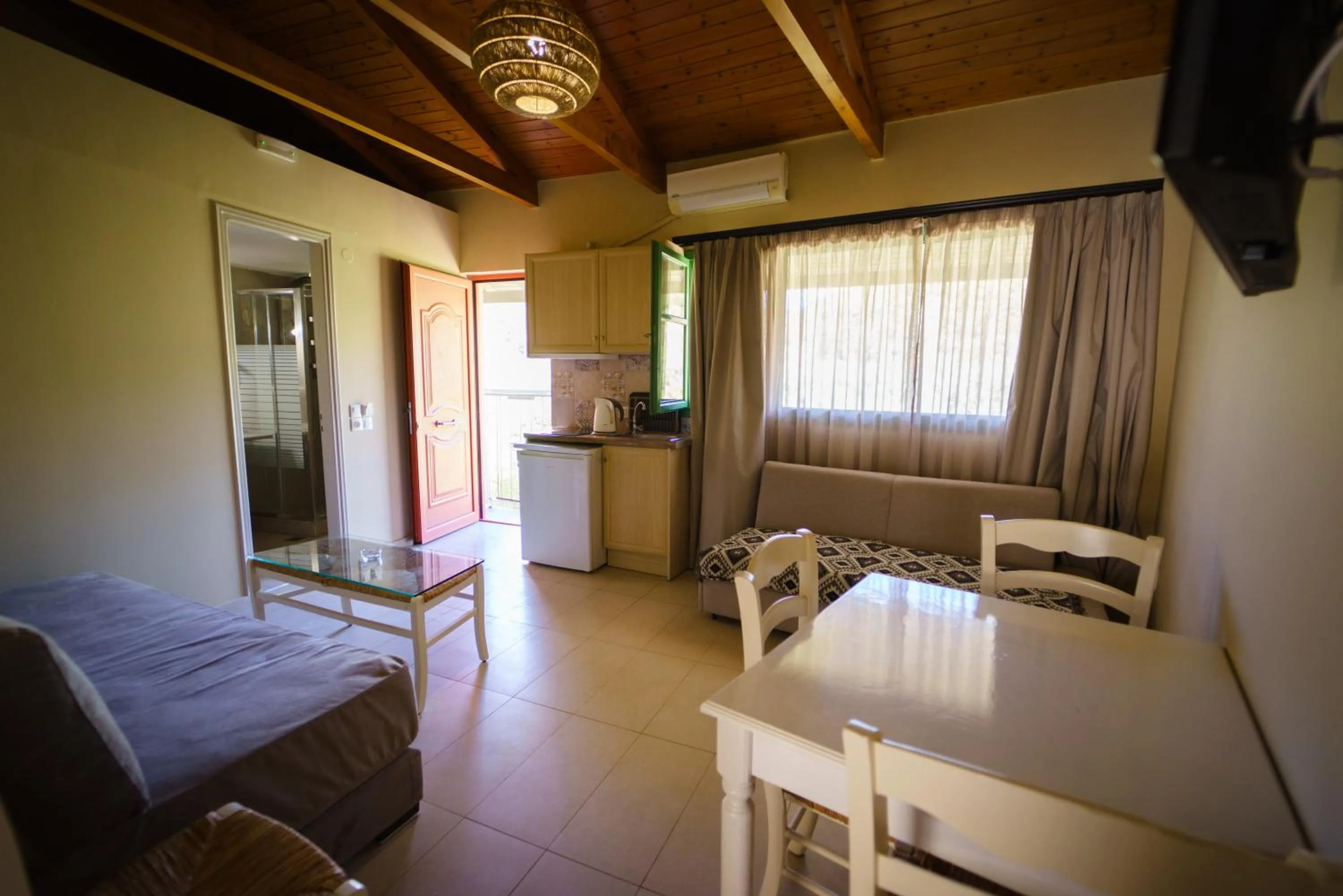 Bed in Rouda Bay Beach Hotel