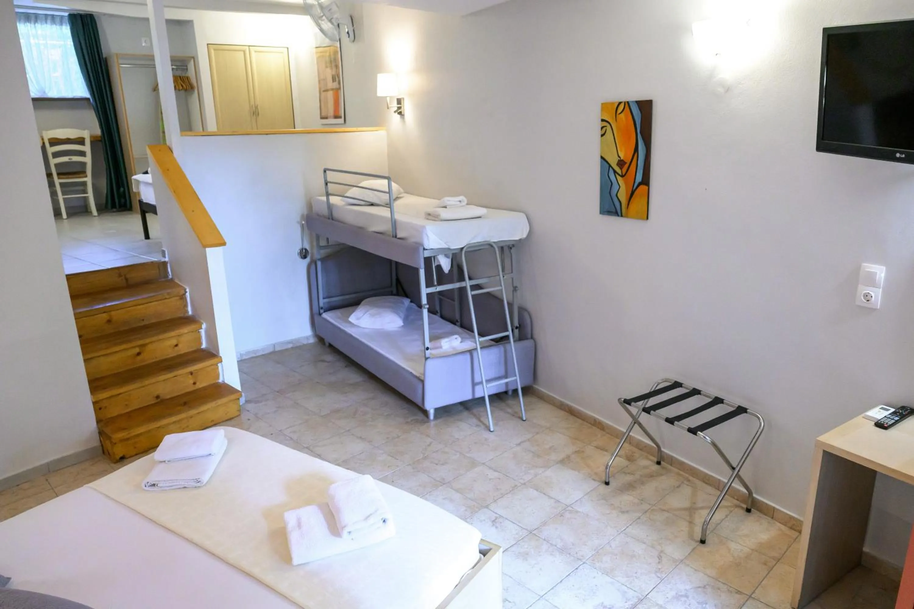 Bed in Rouda Bay Beach Hotel