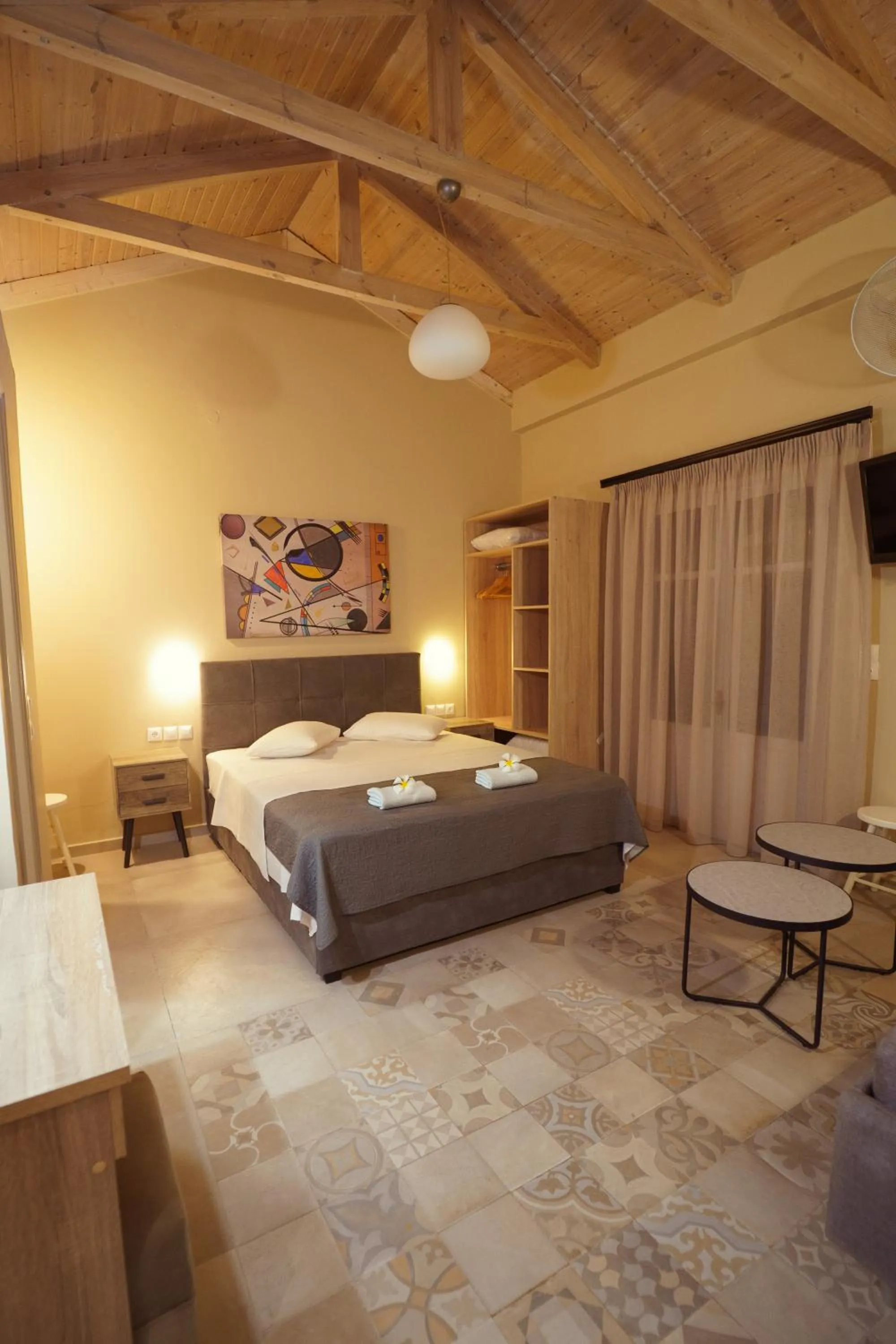 Bed in Rouda Bay Beach Hotel