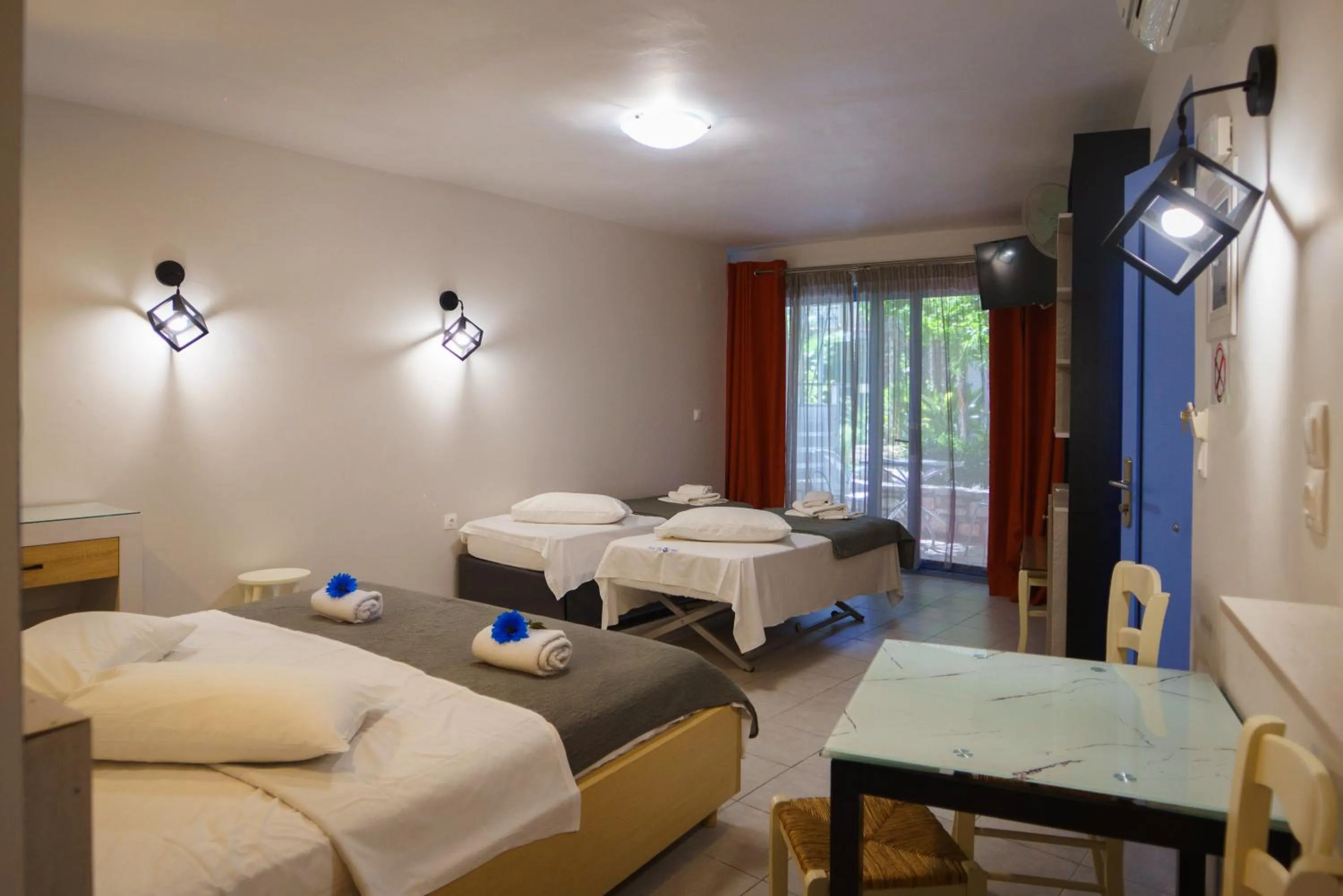 Bed in Rouda Bay Beach Hotel