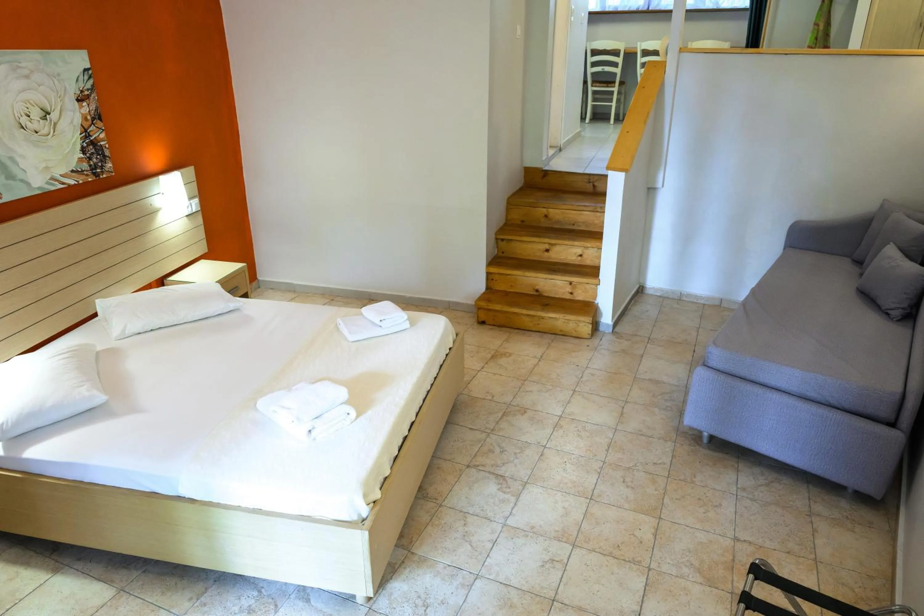 Bed in Rouda Bay Beach Hotel