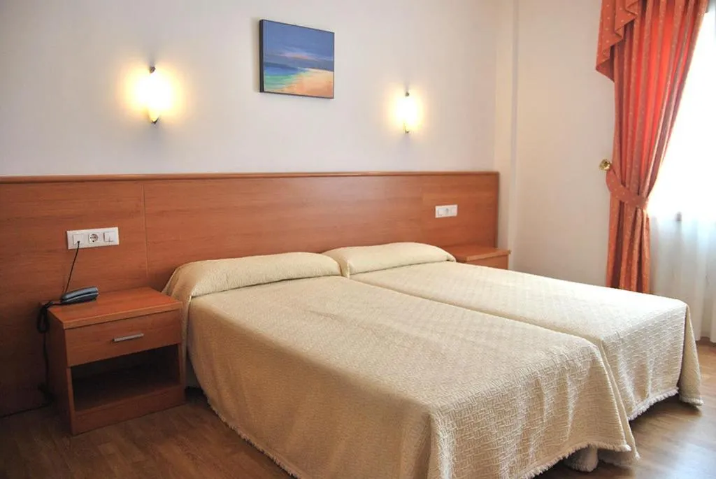 Bed in Hotel Plaza