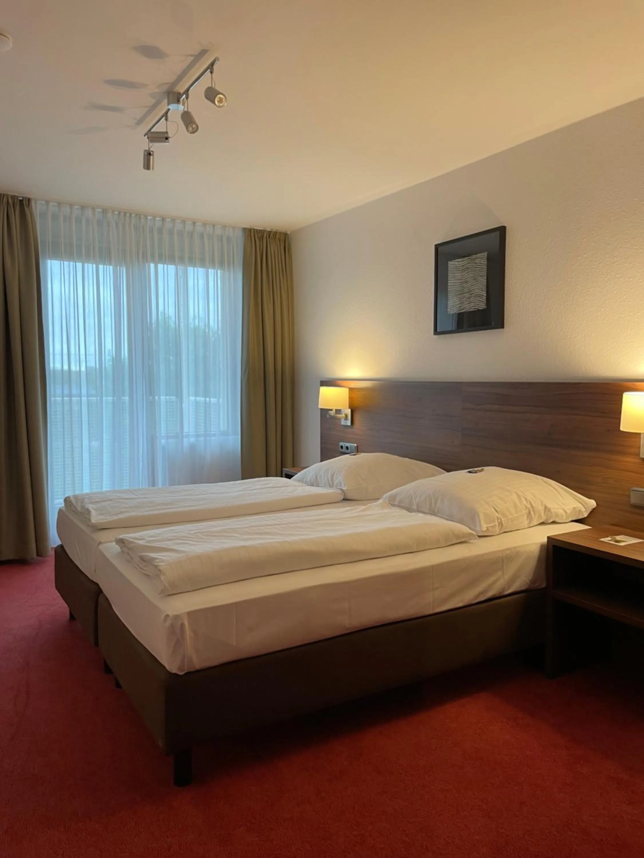 Bed in Hotel Gästehaus Forum am Westkreuz