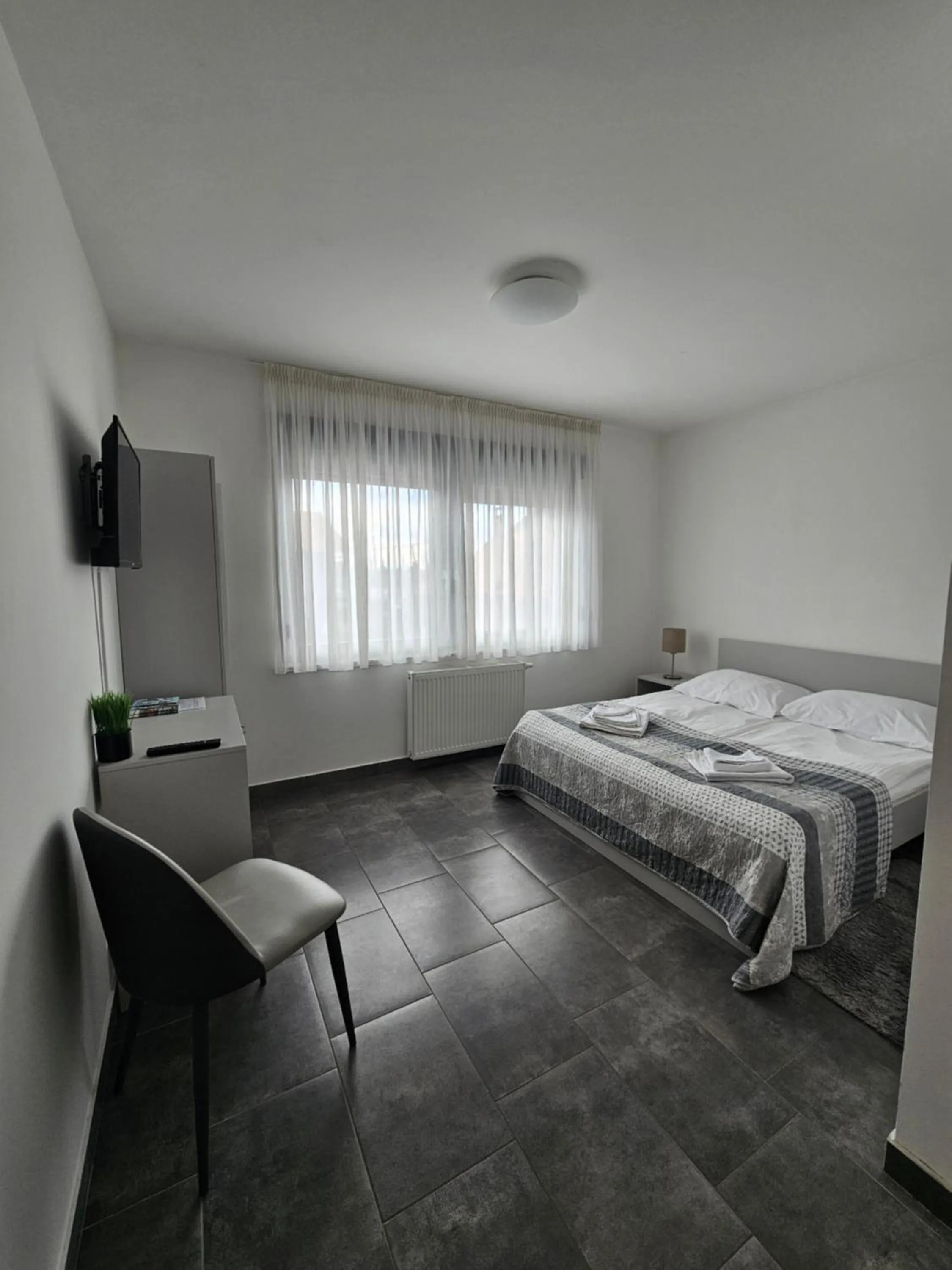 Bed in Filipovic rent a car & apartments