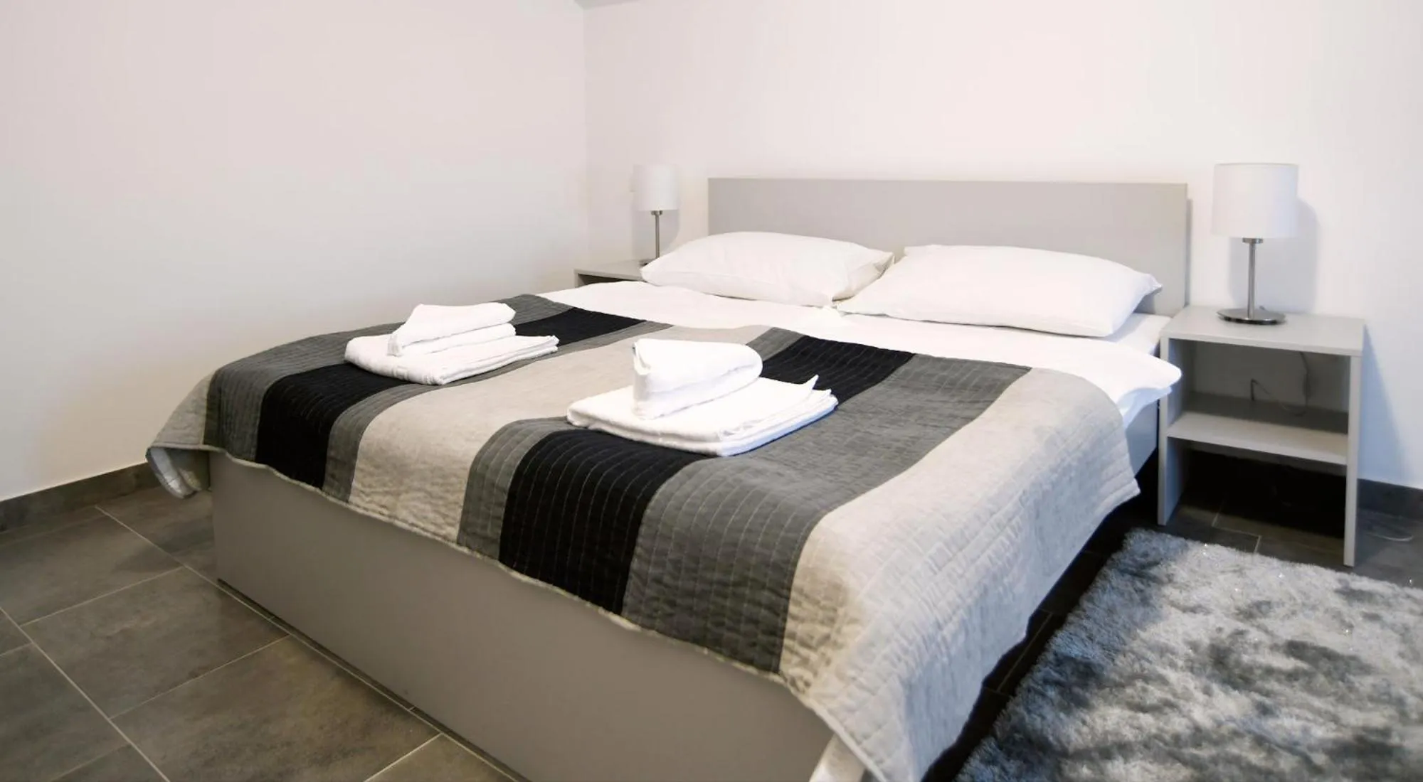 Bed in Filipovic rent a car & apartments