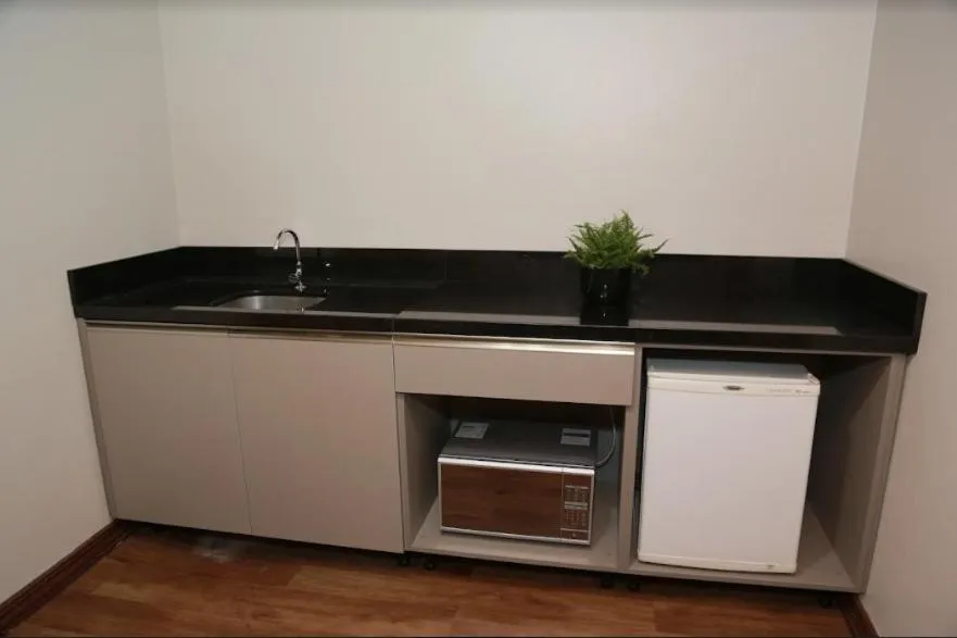 Kitchen or kitchenette in Letto Hotel Flores da Cunha