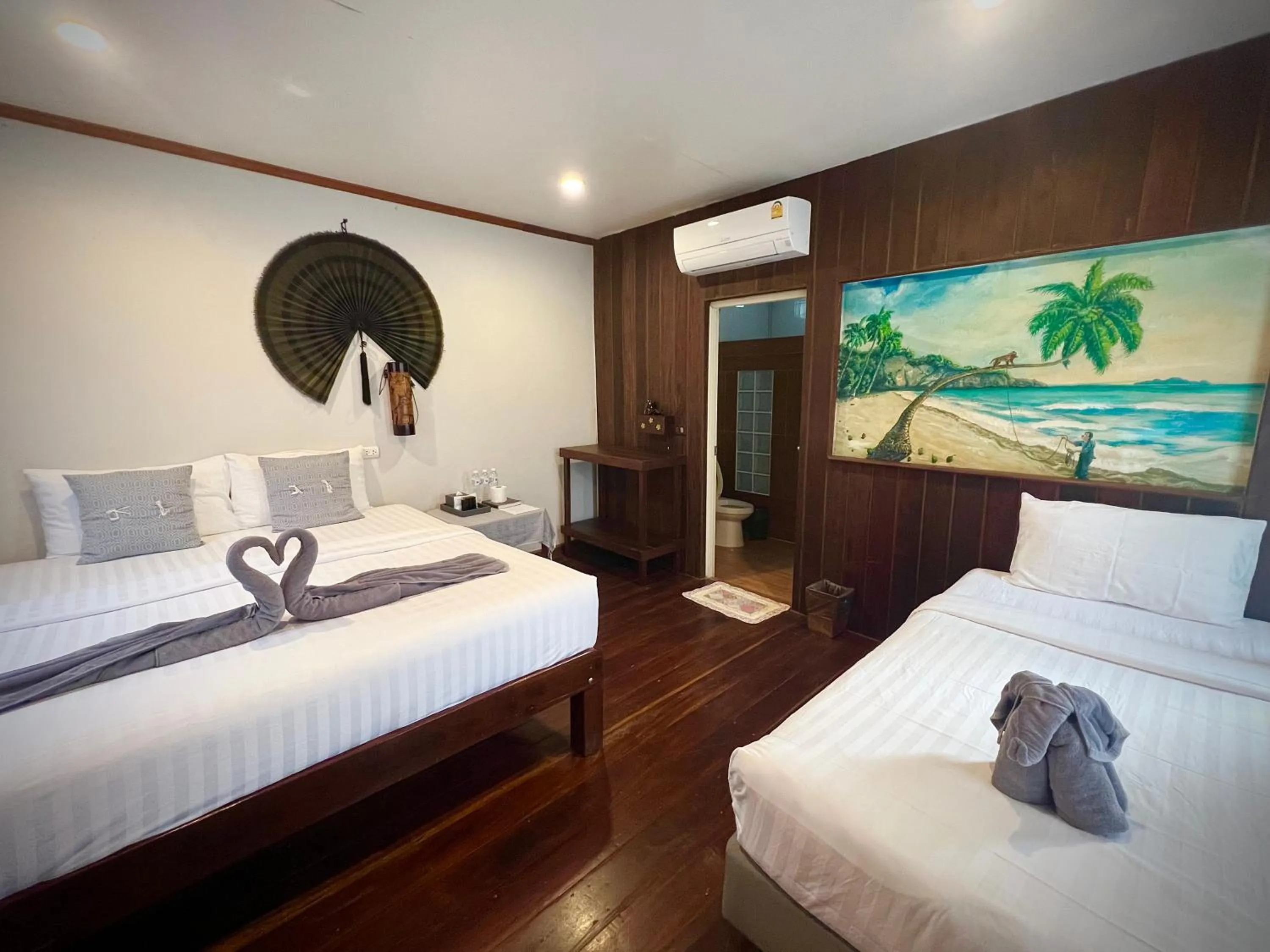 Bed in V-View Beach Resort