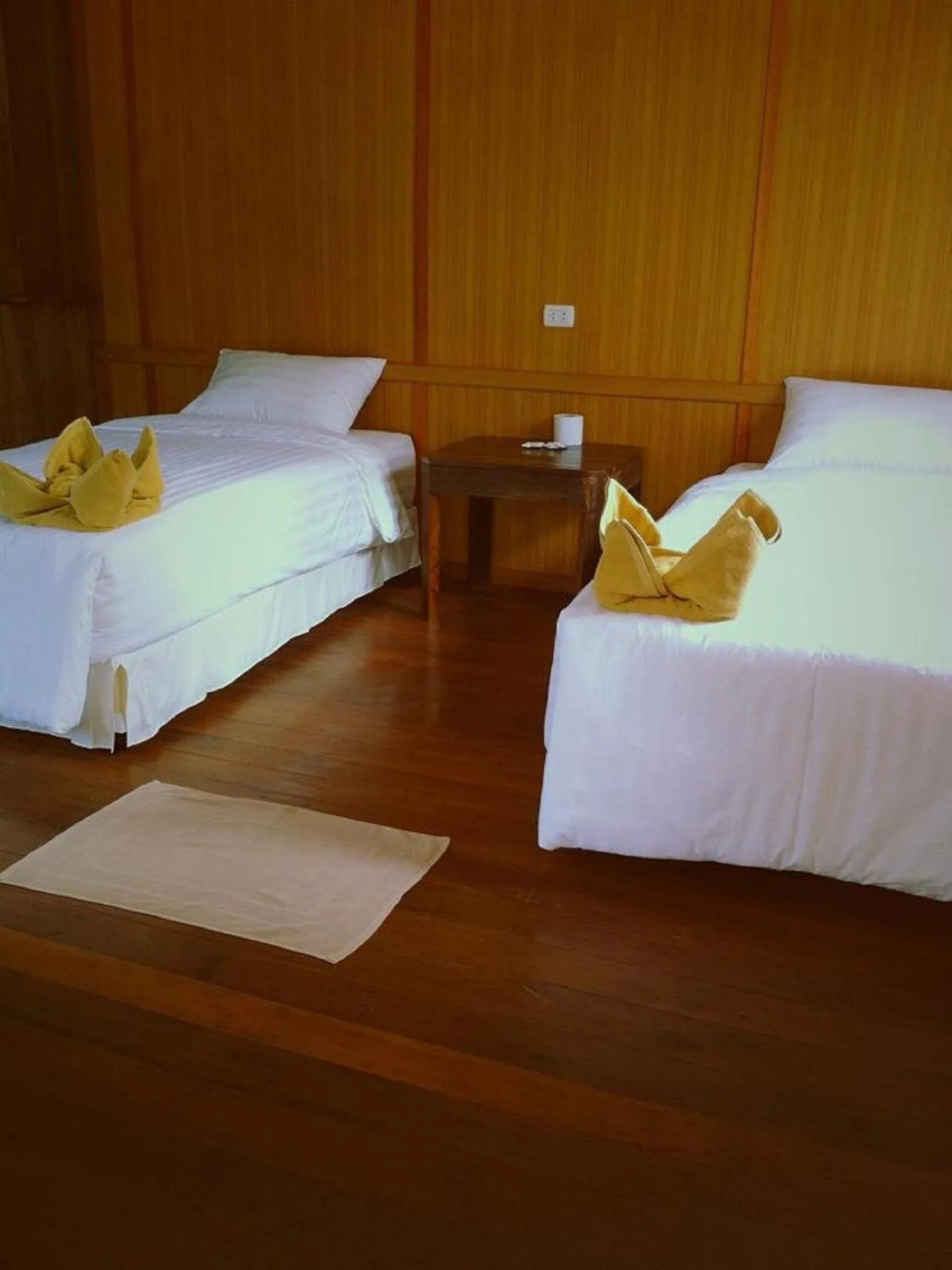 Bed in V-View Beach Resort