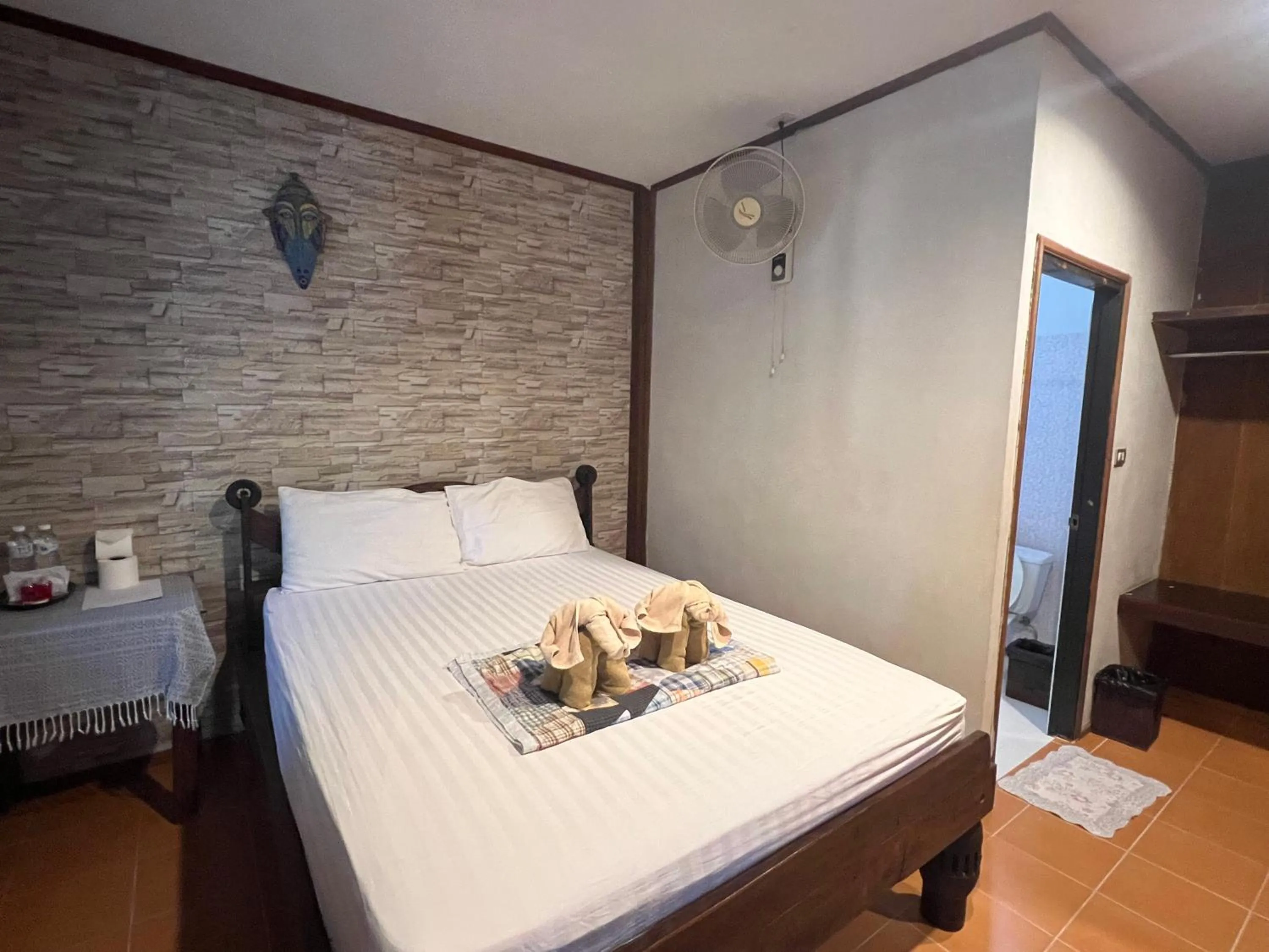 Bed in V-View Beach Resort