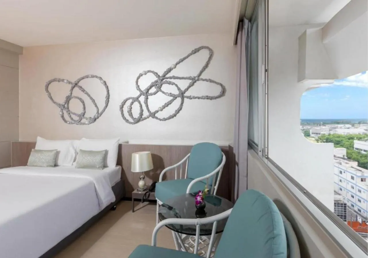 Bed in Pearl Hotel Phuket