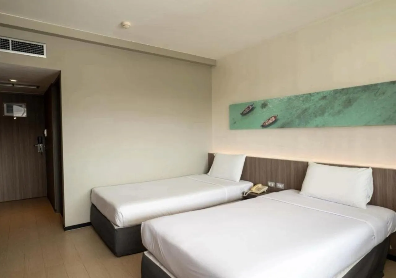 Bed in Pearl Hotel Phuket
