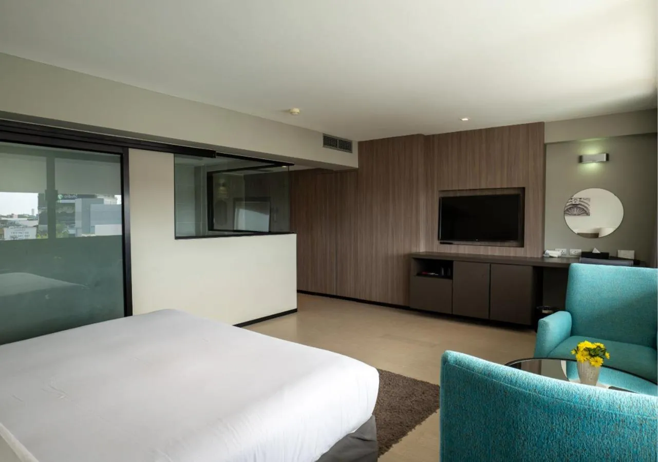 Bed in Pearl Hotel Phuket