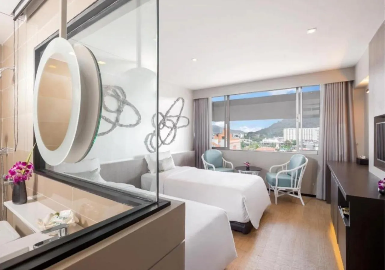 Bed in Pearl Hotel Phuket