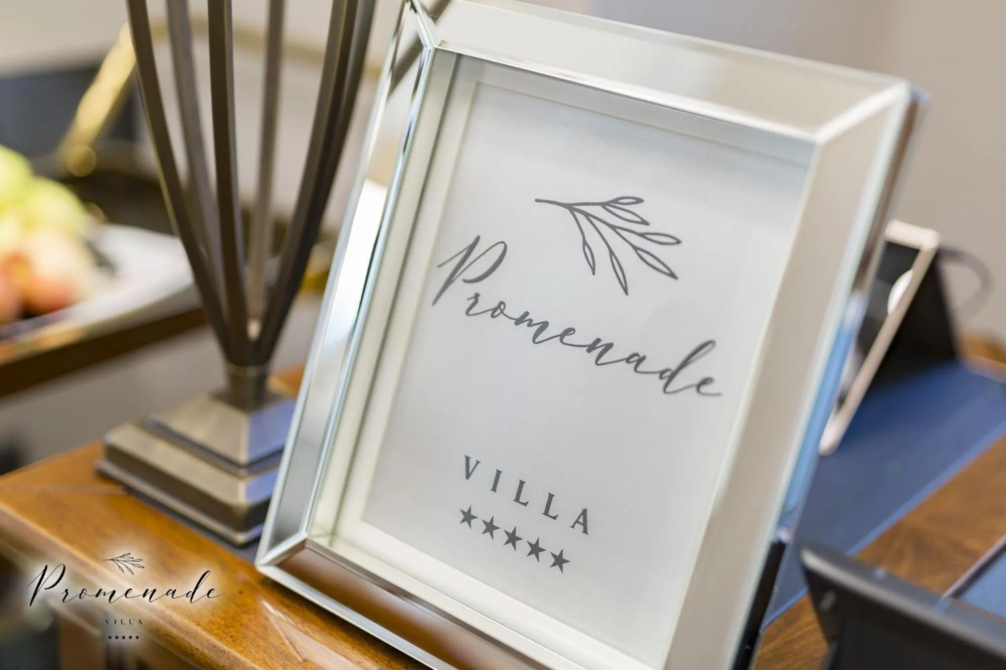 Property logo or sign in Villa Promenade