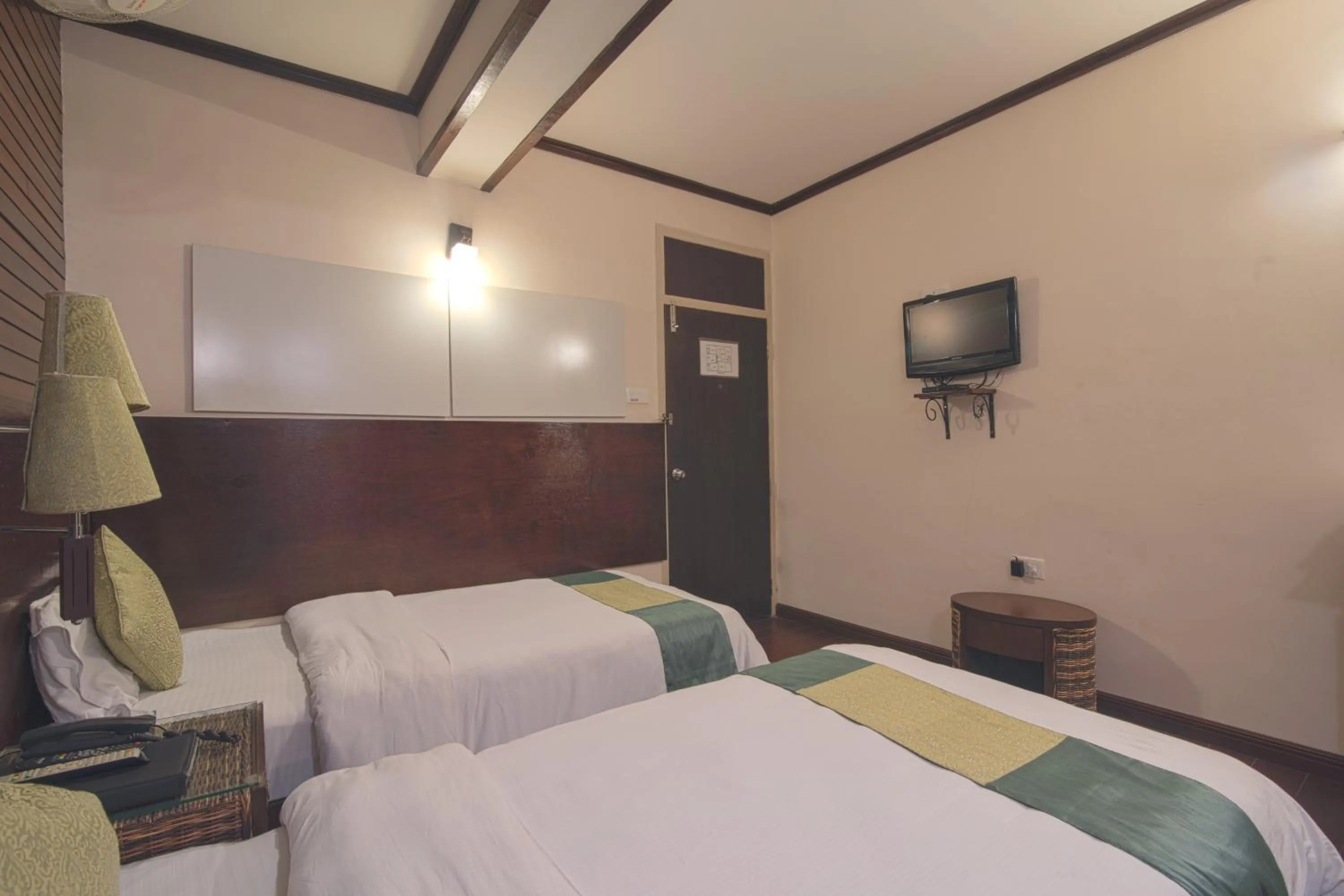 Bed in The Nettle and Fern Hotel Gangtok