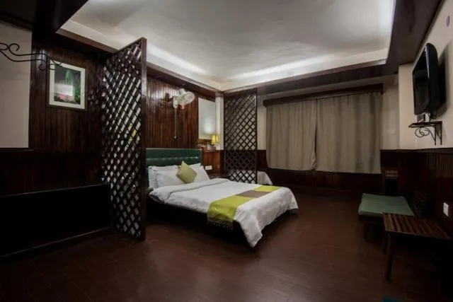 Photo of the whole room, Bed in The Nettle and Fern Hotel Gangtok