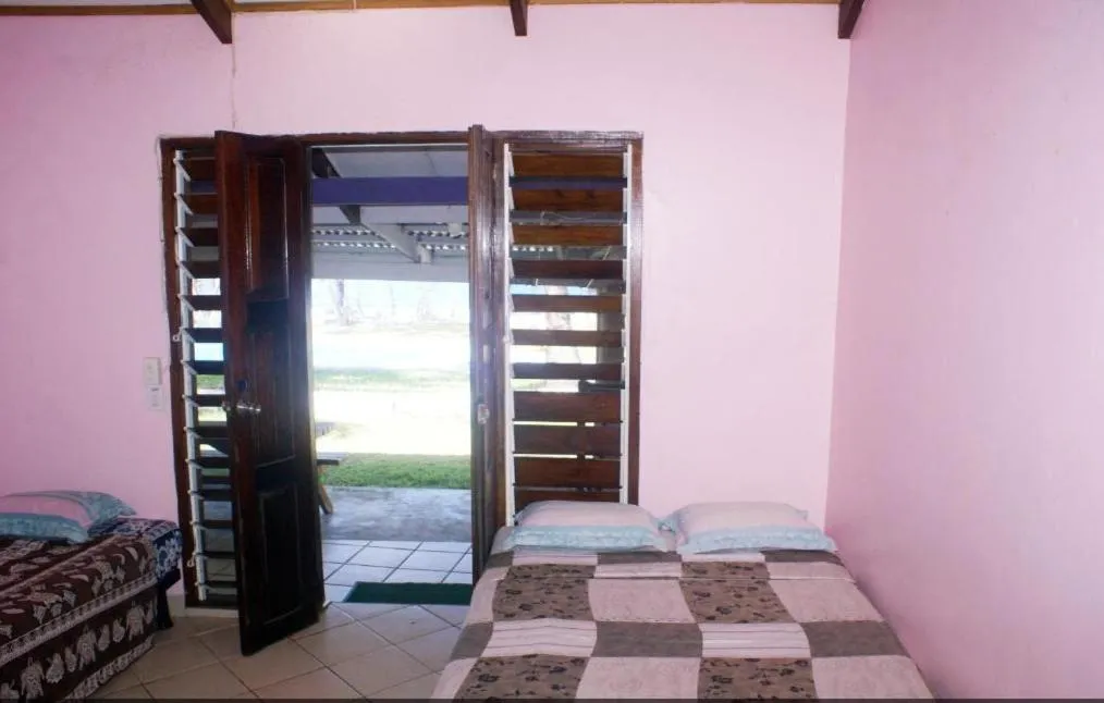 Bed in Bluepango Guest House