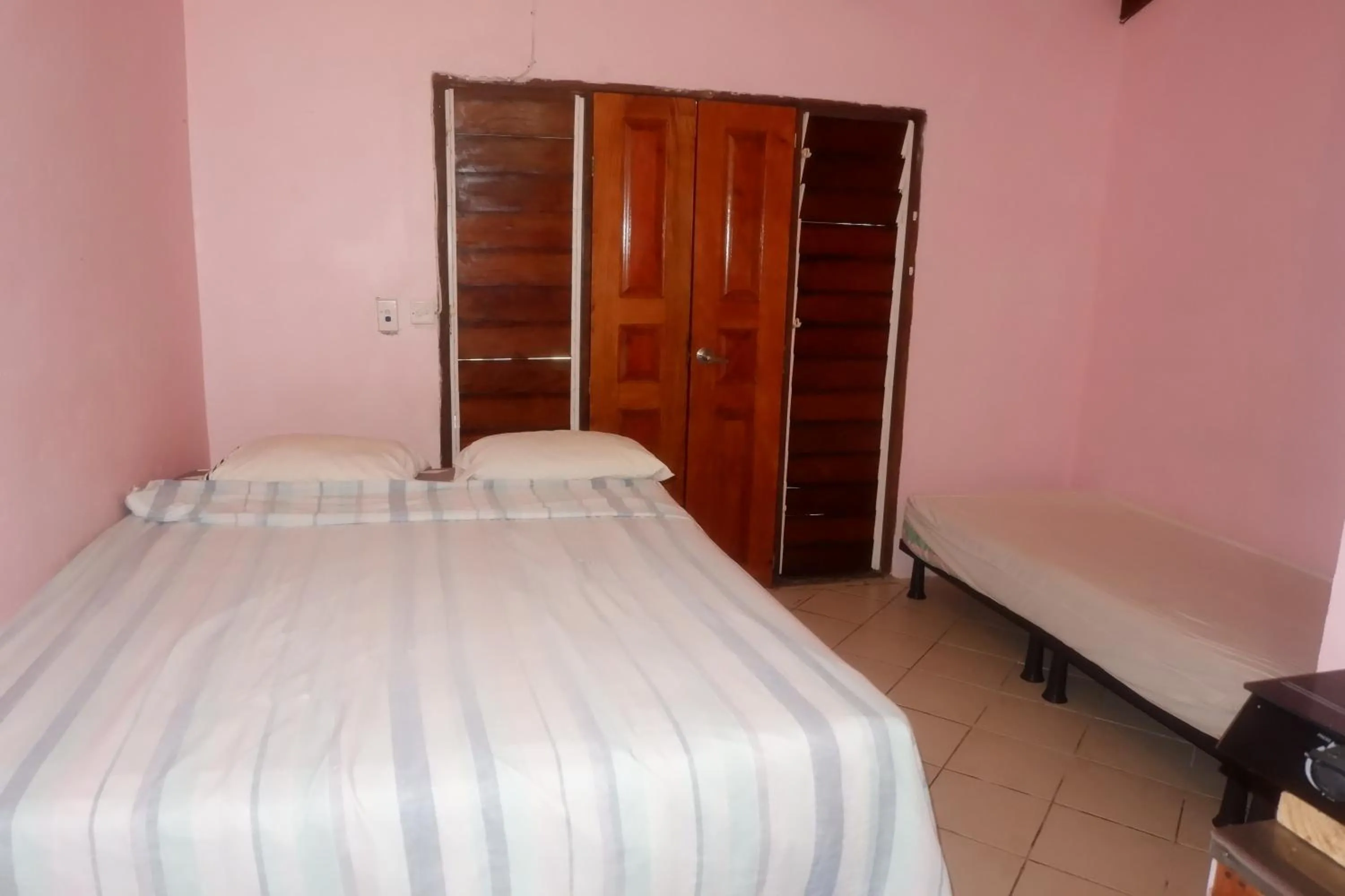 Bed in Bluepango Guest House