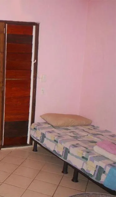 Bed in Bluepango Guest House