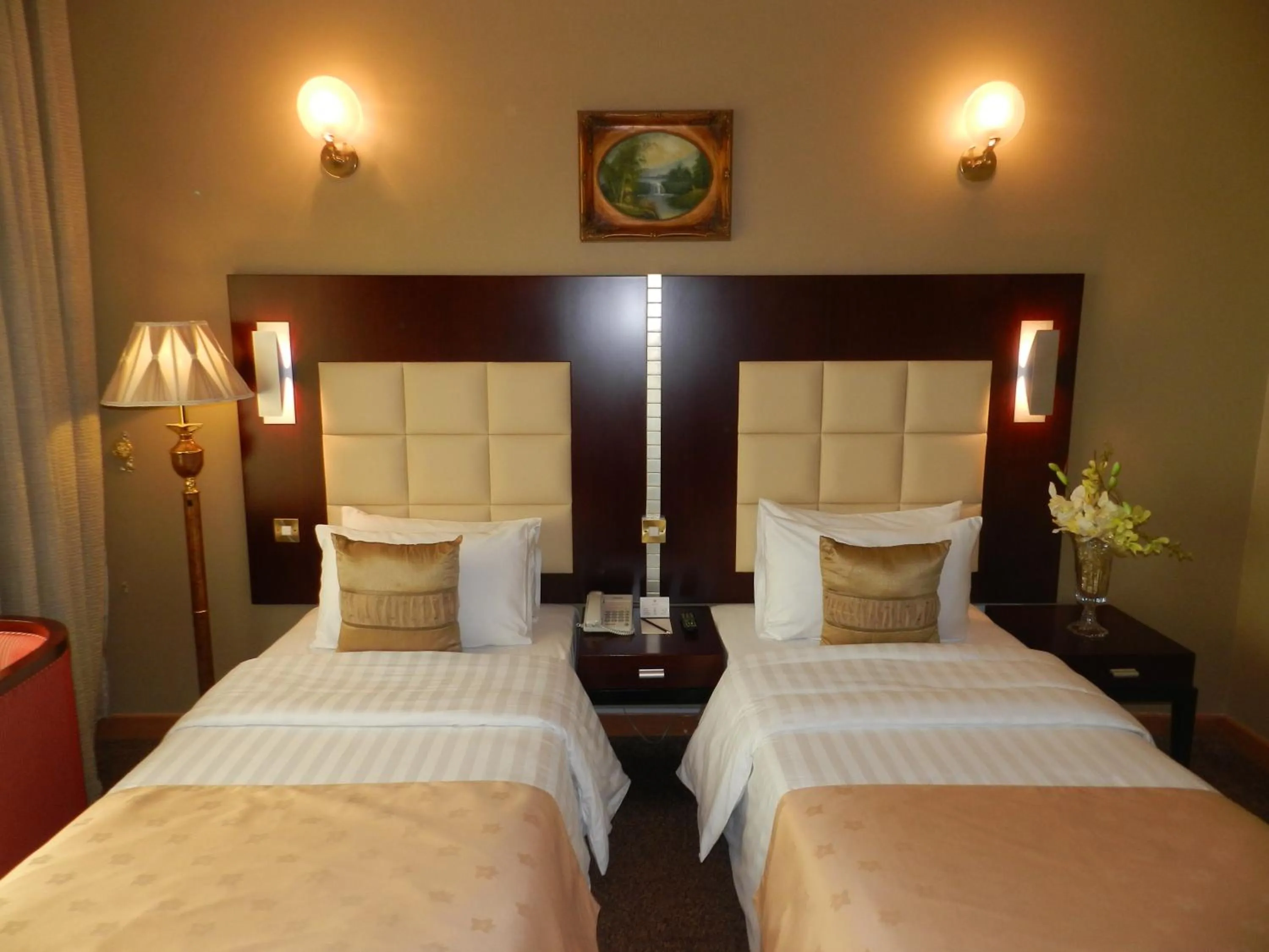 Bed in Sun & Sands Sea View Hotel