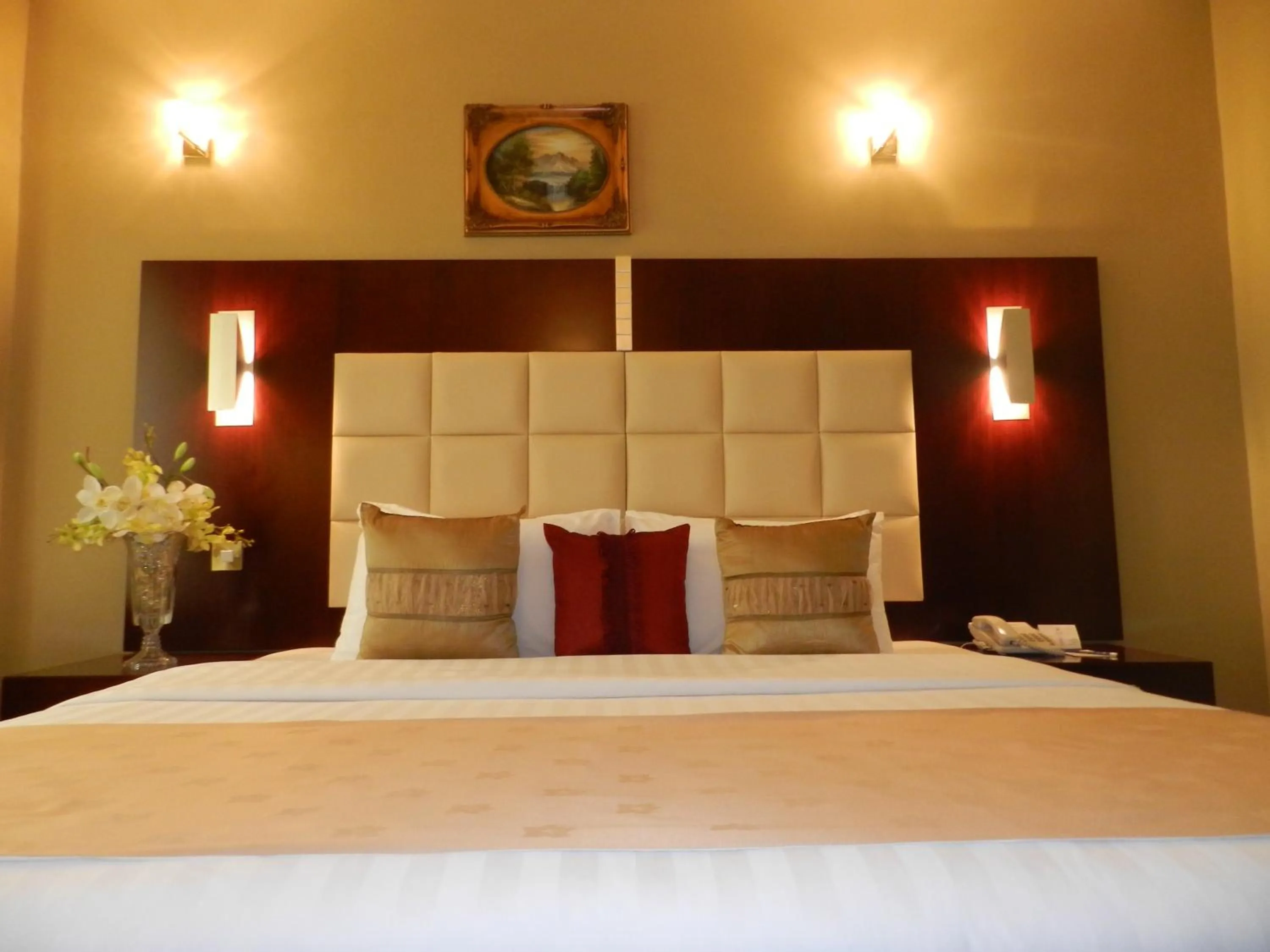 Bed in Sun & Sands Sea View Hotel