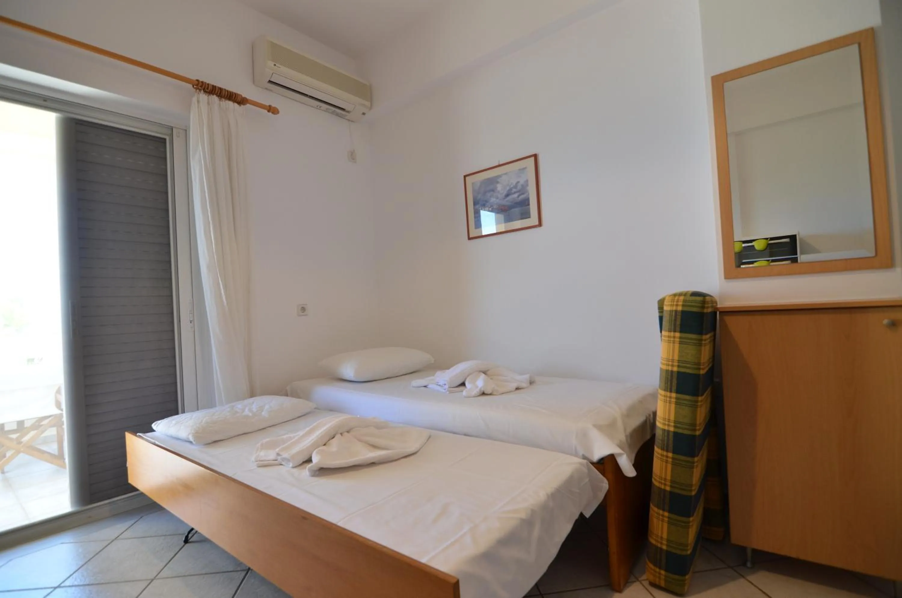 Bed in Thalassa Apartments