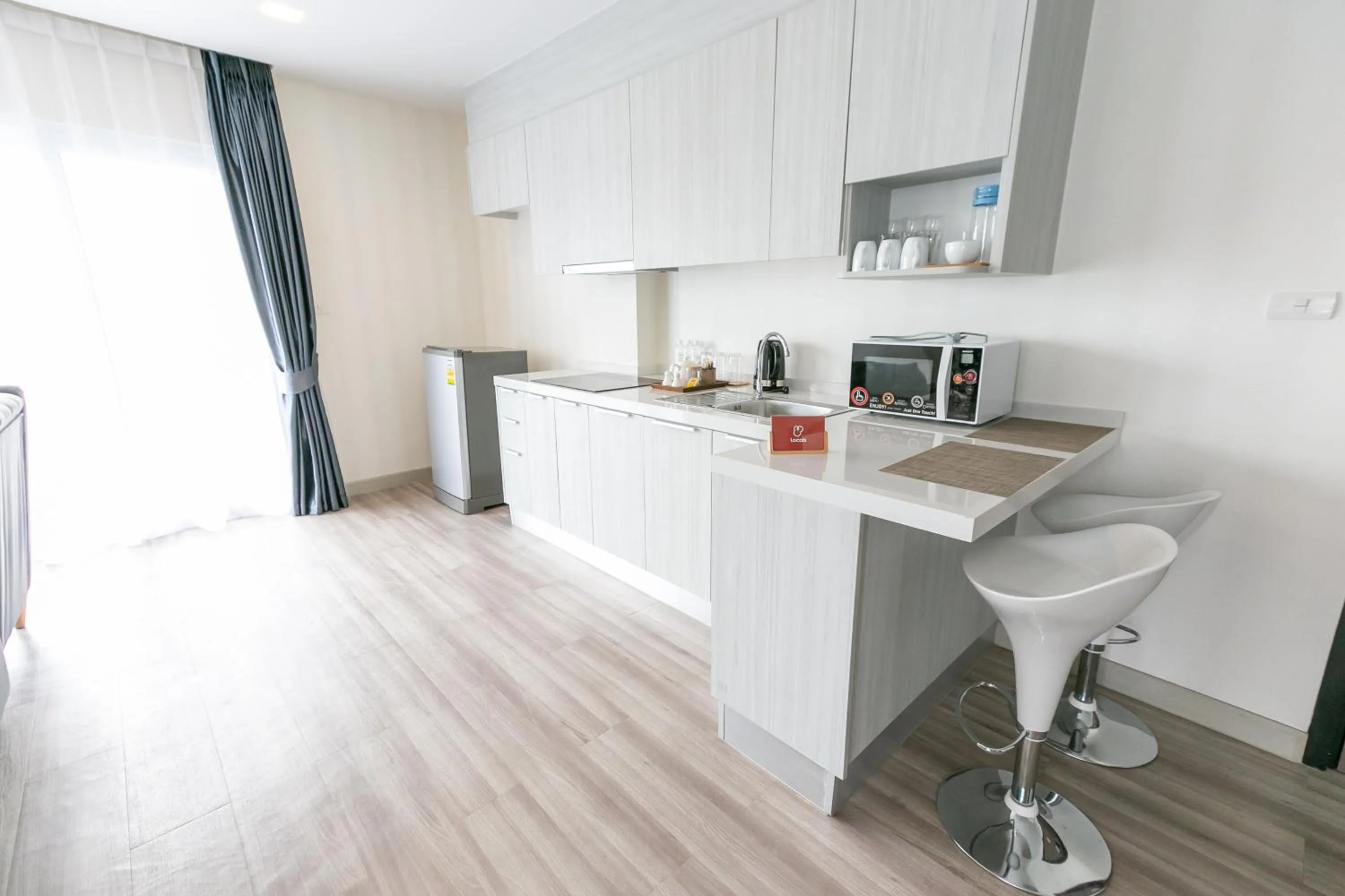 Kitchen or kitchenette in Locals Prio ChiangMai Central Airport Plaza