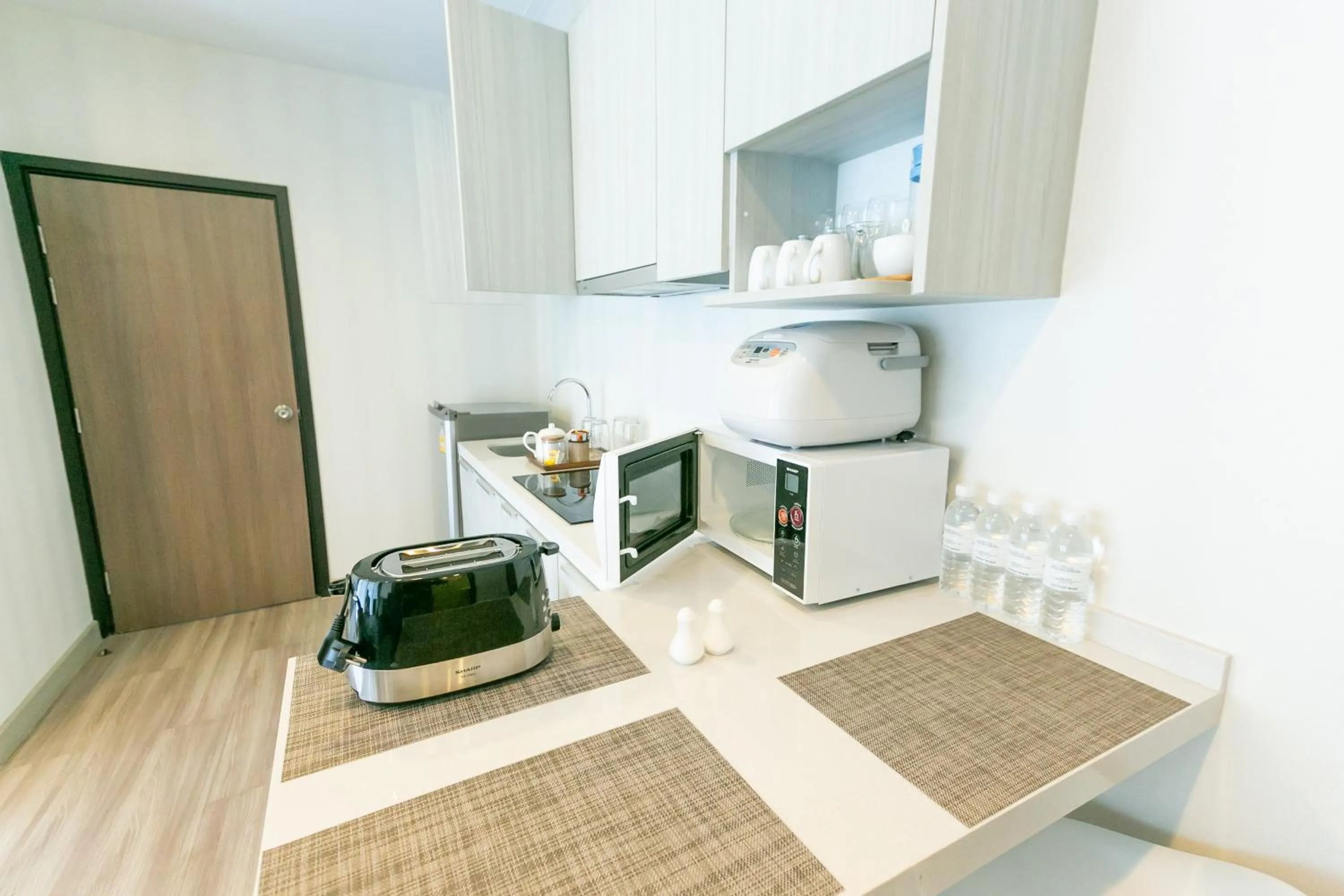 Kitchen or kitchenette in Locals Prio ChiangMai Central Airport Plaza