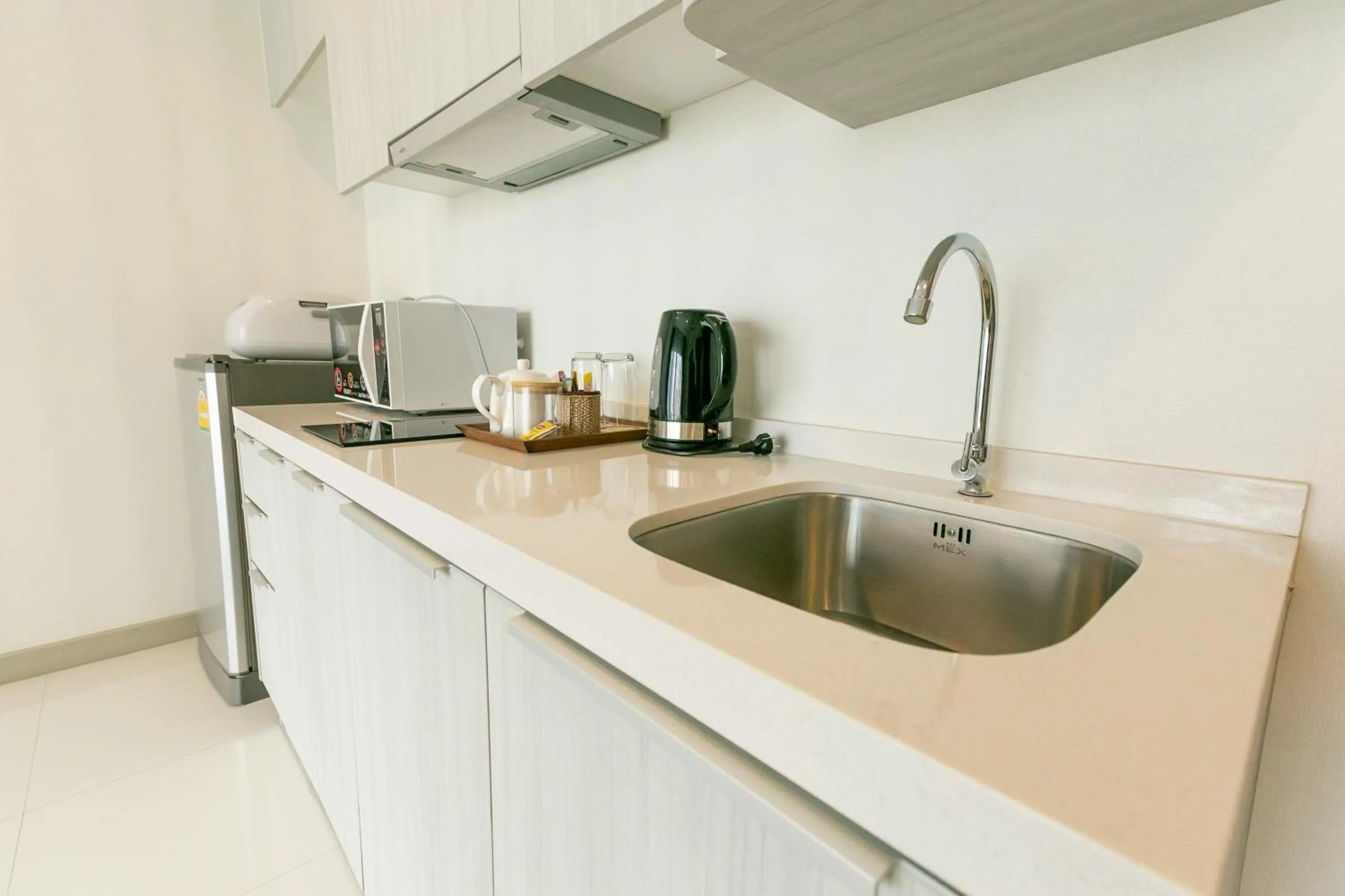 Kitchen or kitchenette in Locals Prio ChiangMai Central Airport Plaza