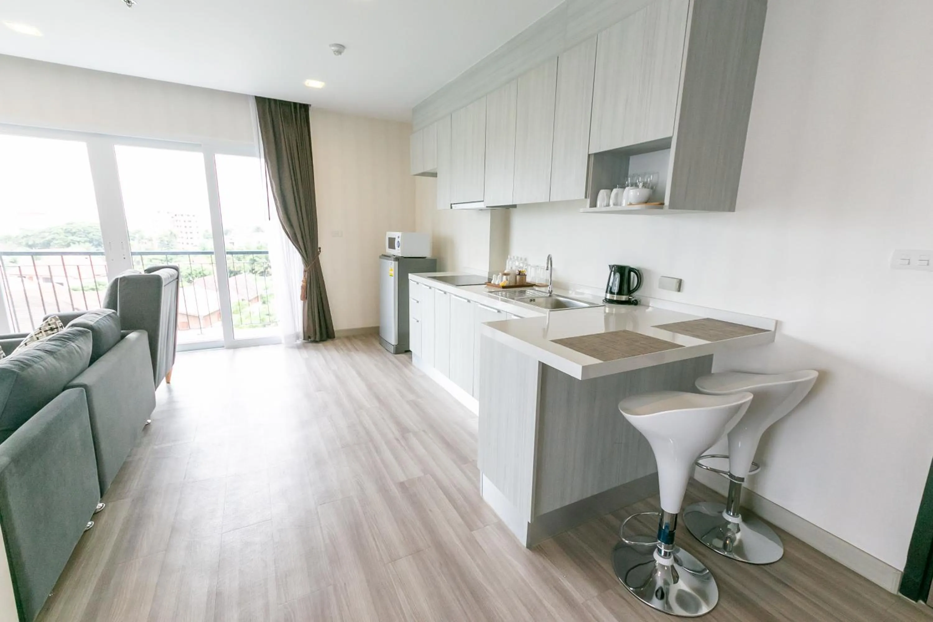 Kitchen or kitchenette in Locals Prio ChiangMai Central Airport Plaza