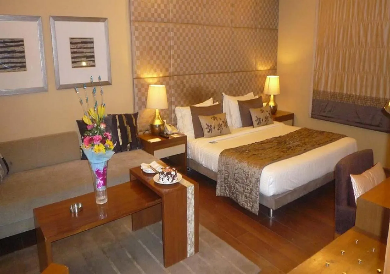 Bed in Udman Hotel Panchshila Park