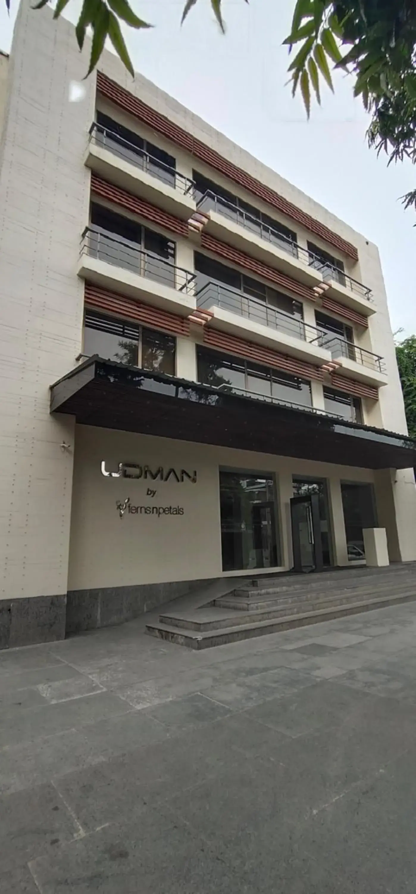 Property building in Udman Hotel Panchshila Park Property building in Udman Hotel Panchshila Park