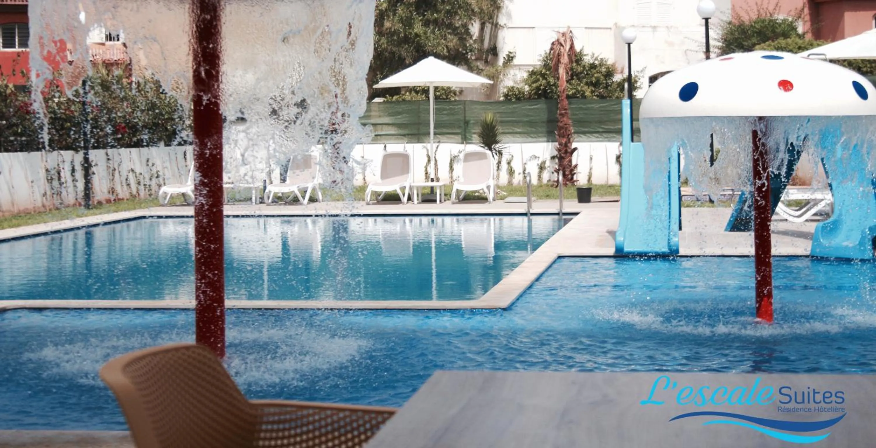 Swimming pool in L'escale Suites Résidence Hôtelière By 7AV HOTELS