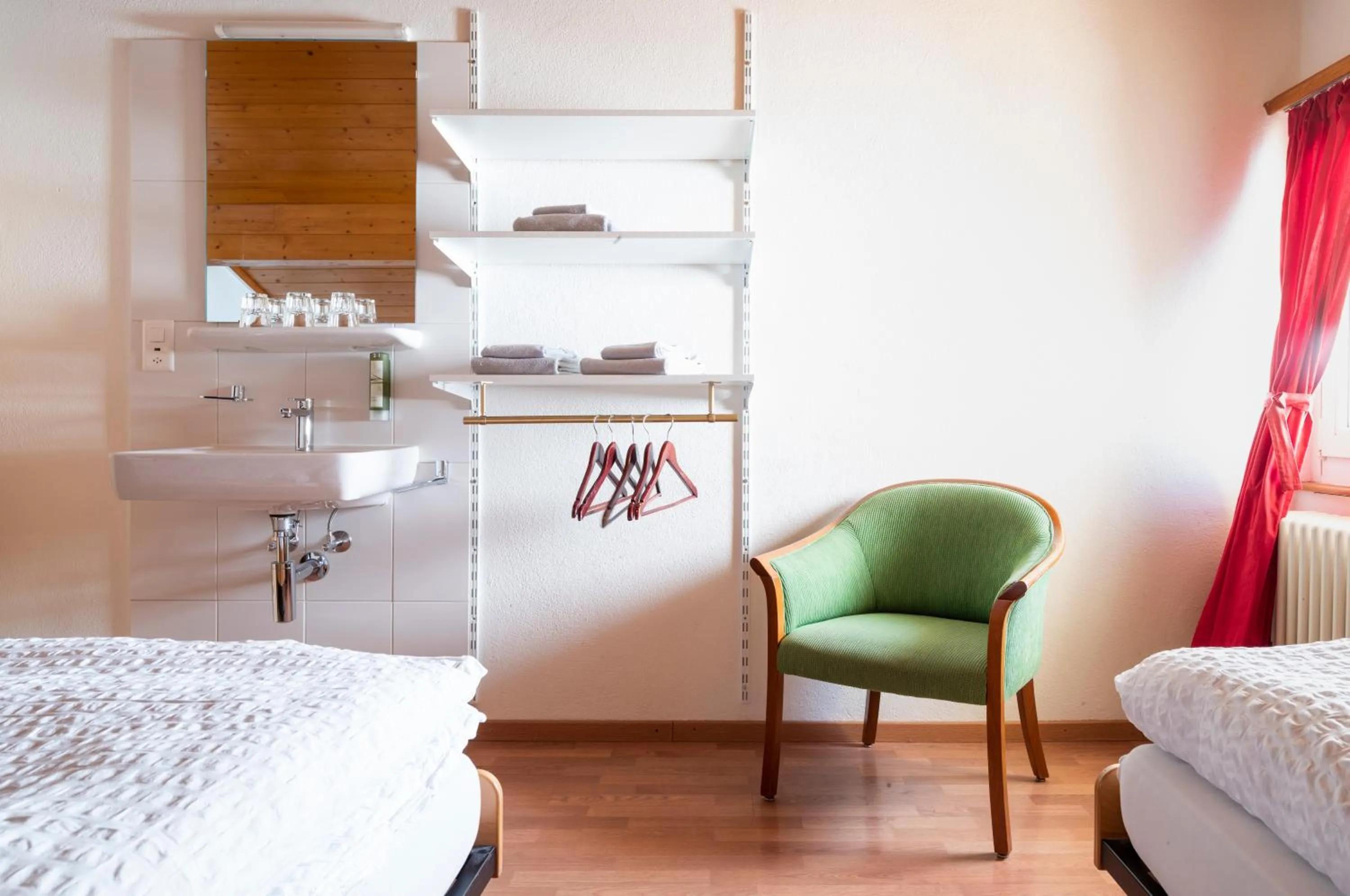 Seating area, Bed in Hotel Schwarzsee