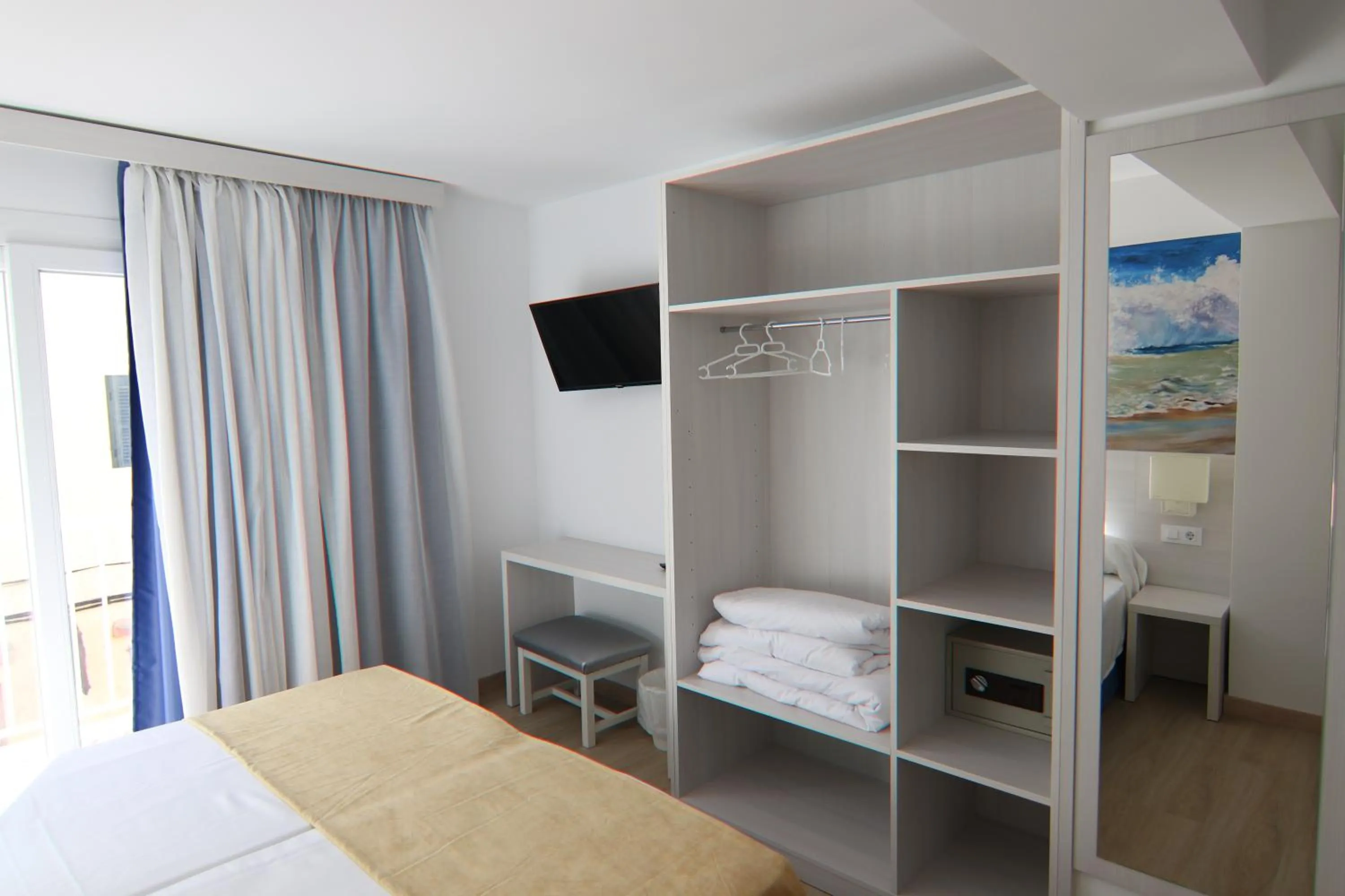 Photo of the whole room, Bed in Hostal Cala Ratjada